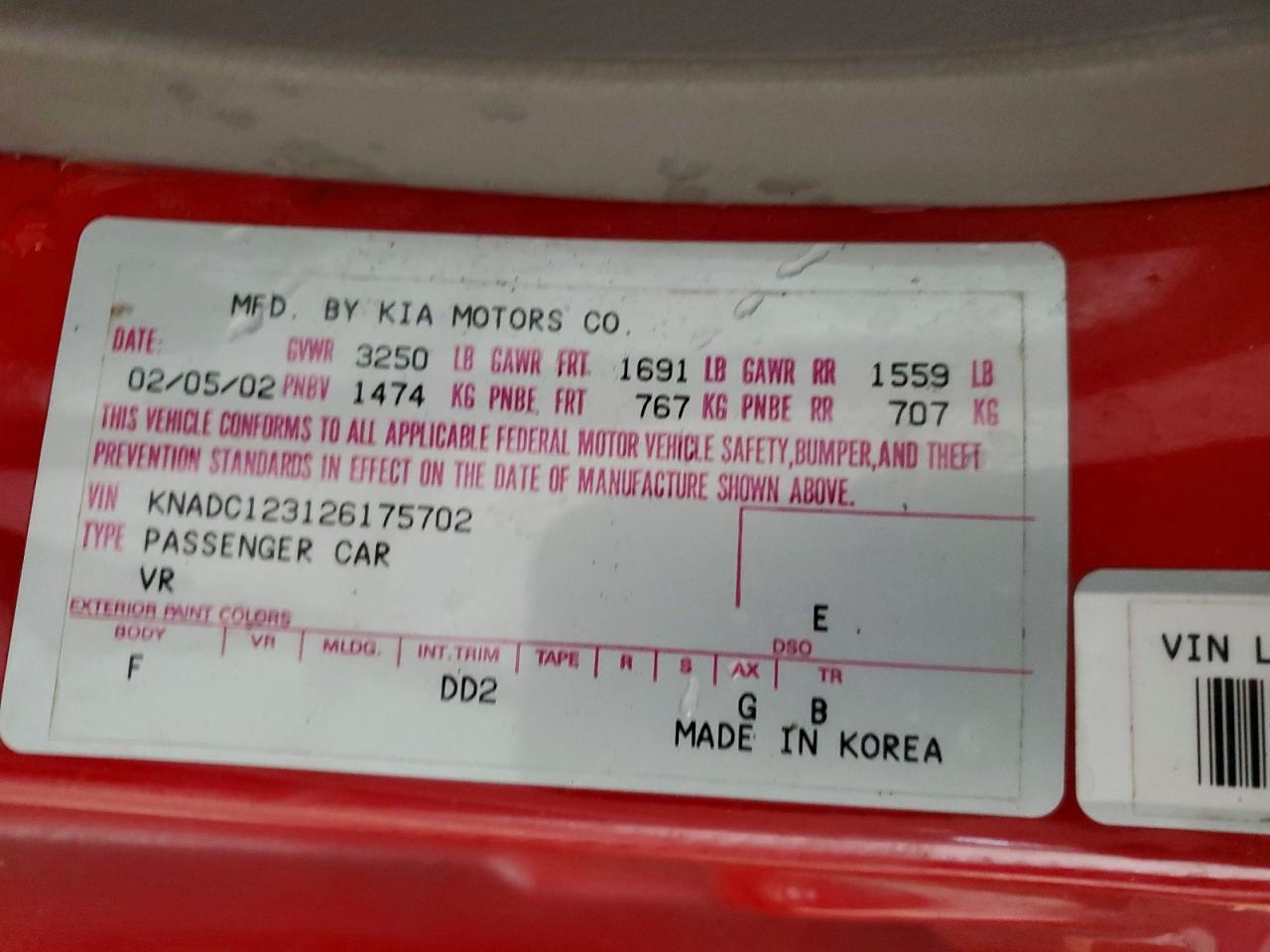 2002 Kia Rio Base Red vin: KNADC123126175702