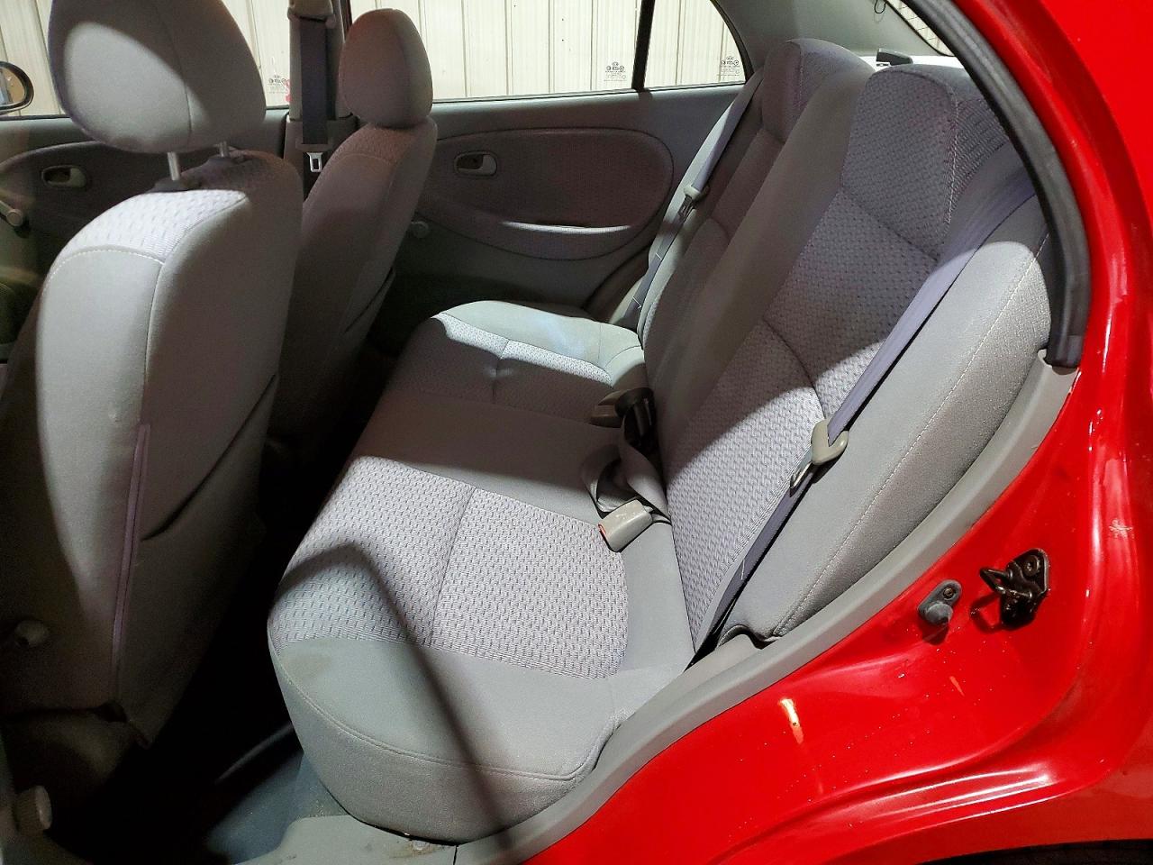 2002 Kia Rio Base Red vin: KNADC123126175702