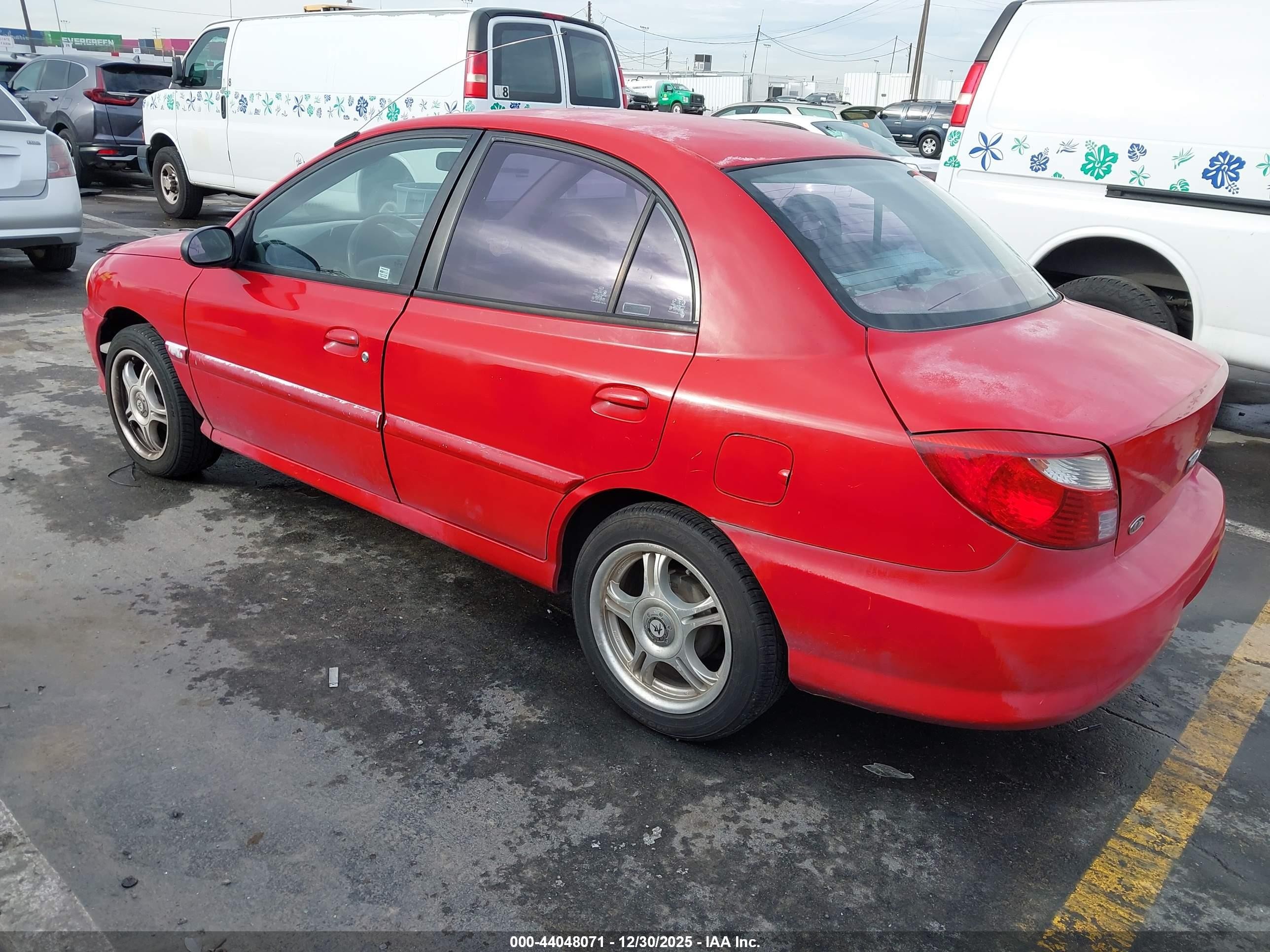 2002 Kia Rio   Red vin: KNADC123226179614