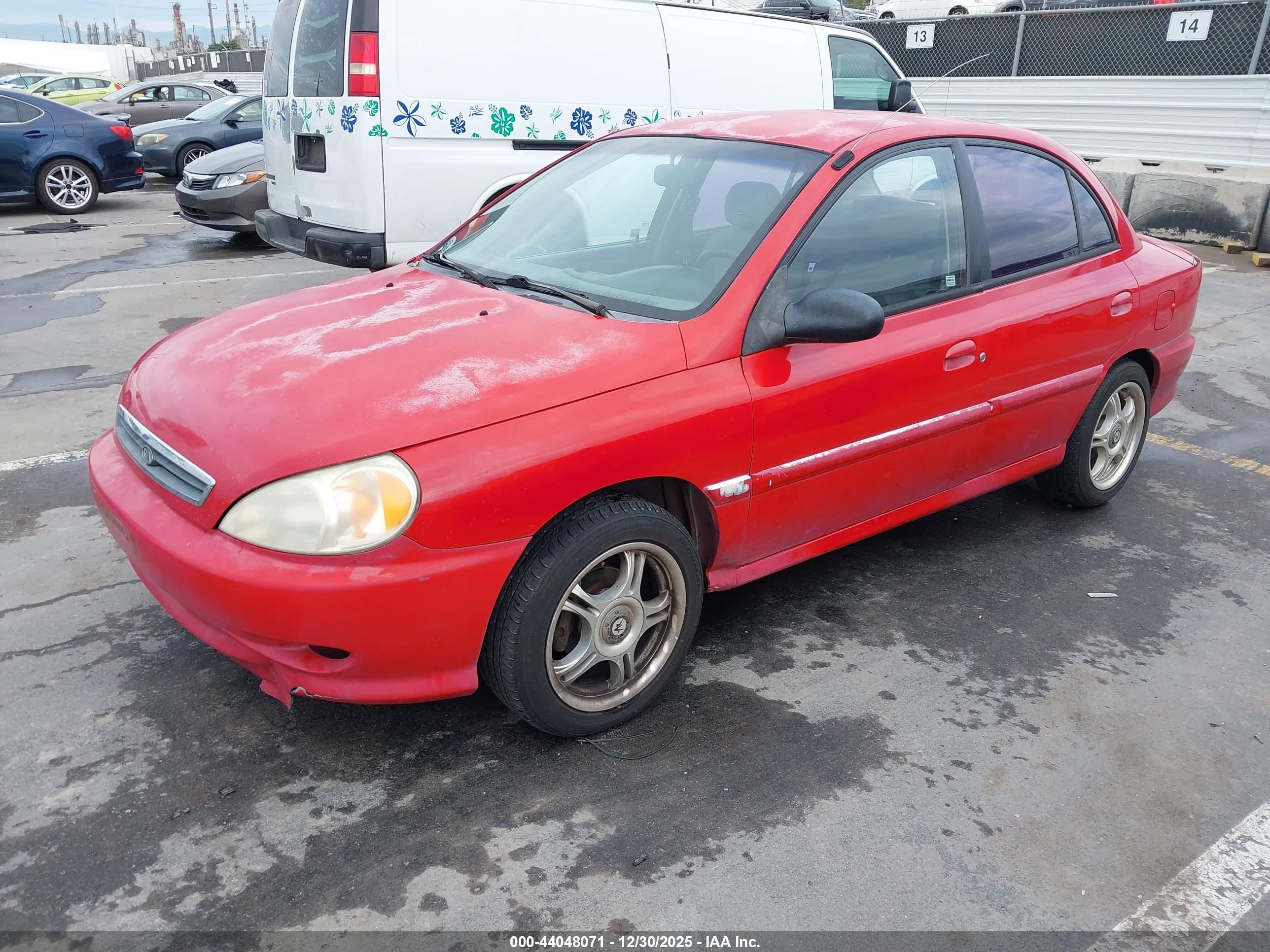 2002 Kia Rio   Red vin: KNADC123226179614