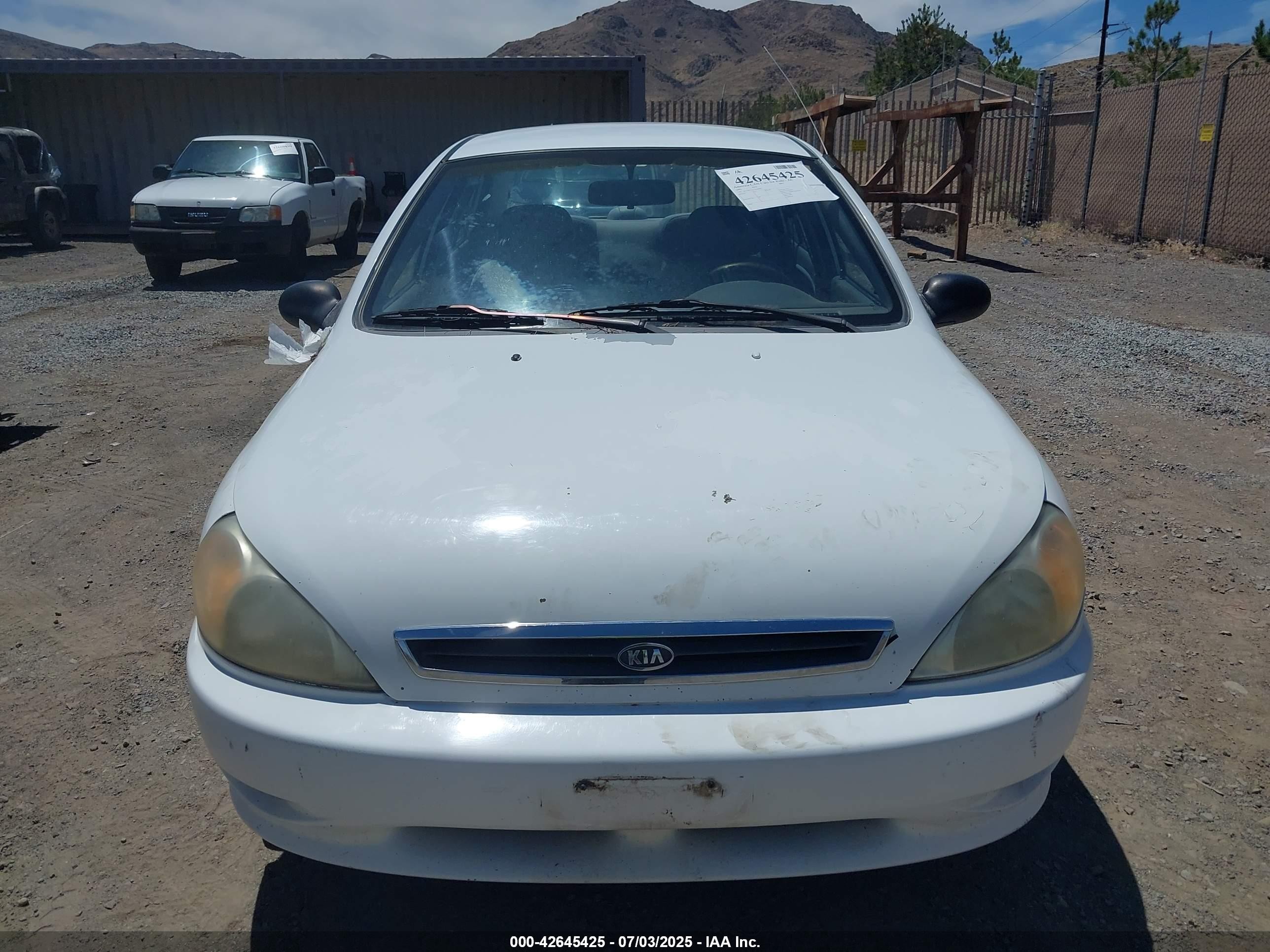 2002 Kia Rio   White vin: KNADC123226189057