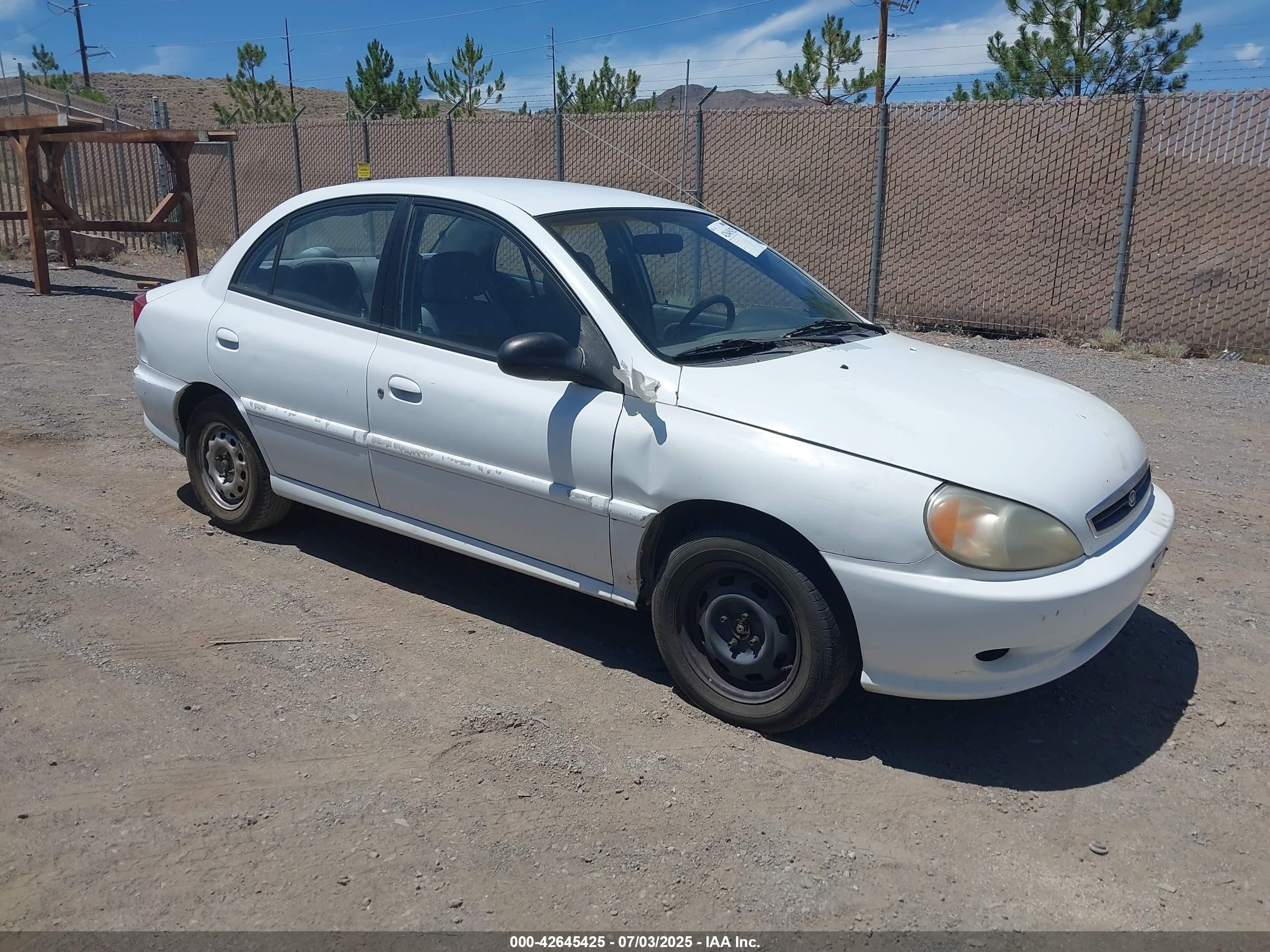 2002 Kia Rio   White vin: KNADC123226189057