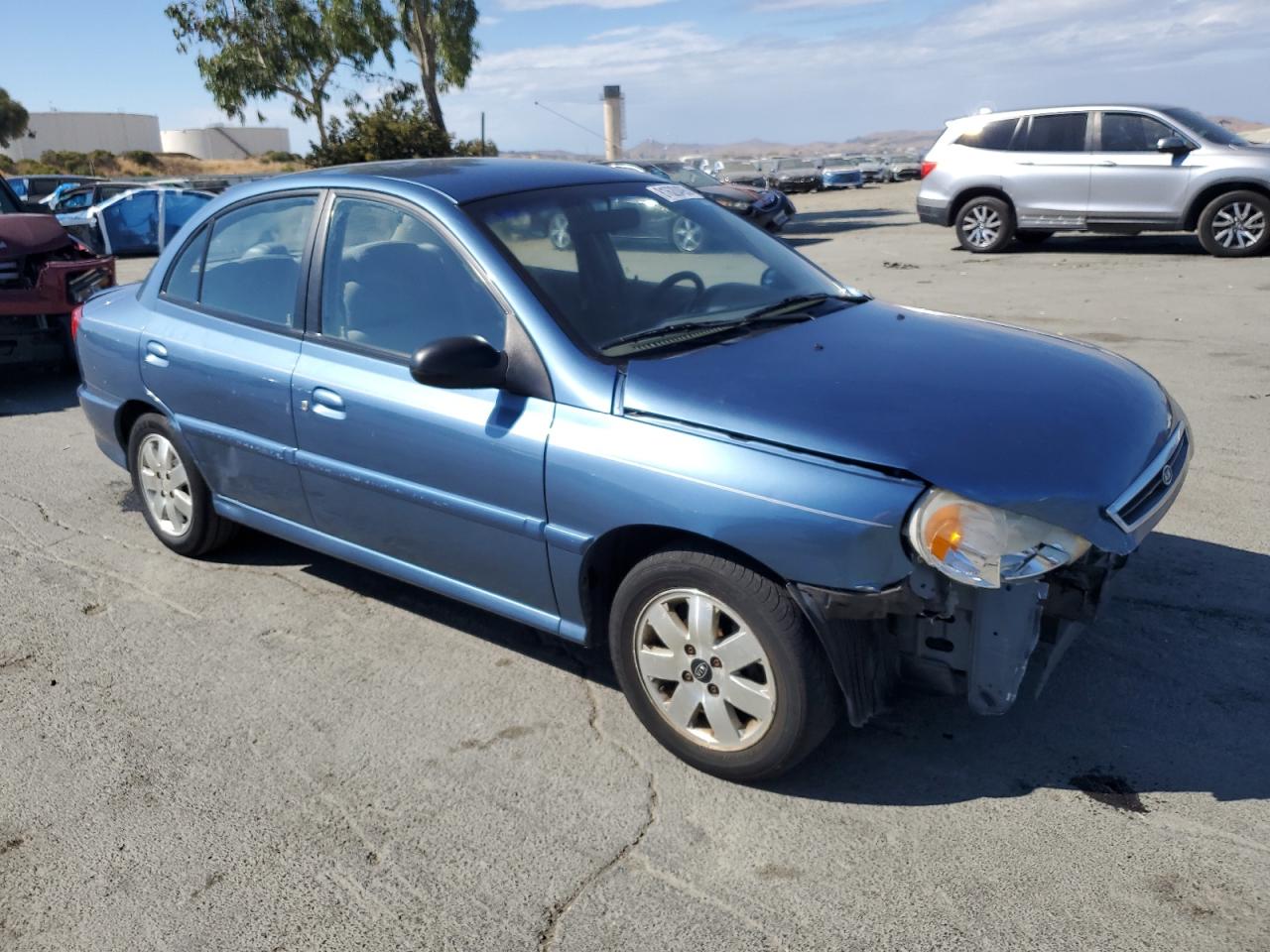 2001 Kia Rio Blue vin: KNADC123316063031