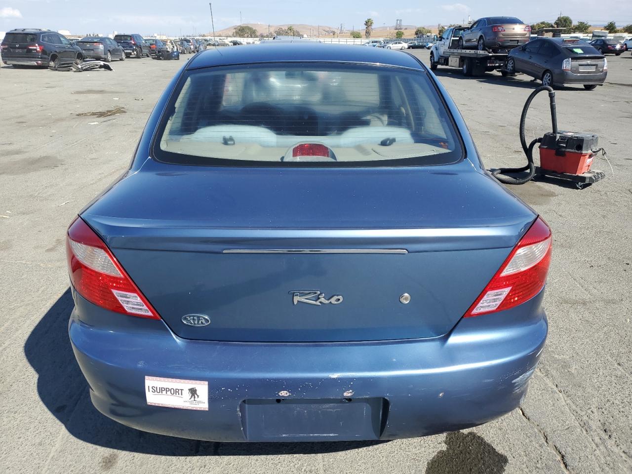 2001 Kia Rio Blue vin: KNADC123316063031