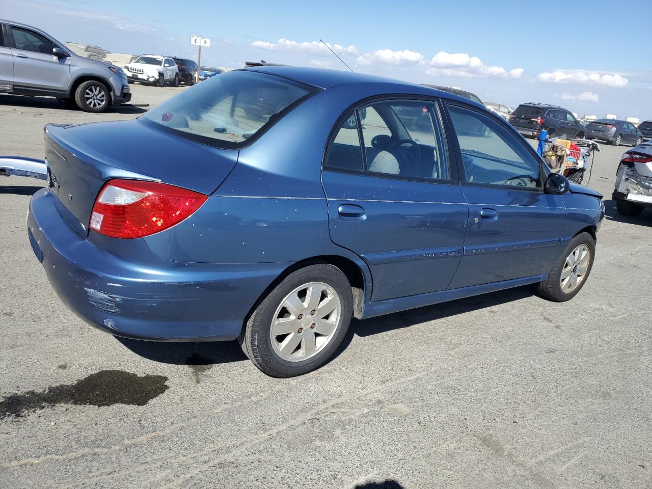 2001 Kia Rio Blue vin: KNADC123316063031
