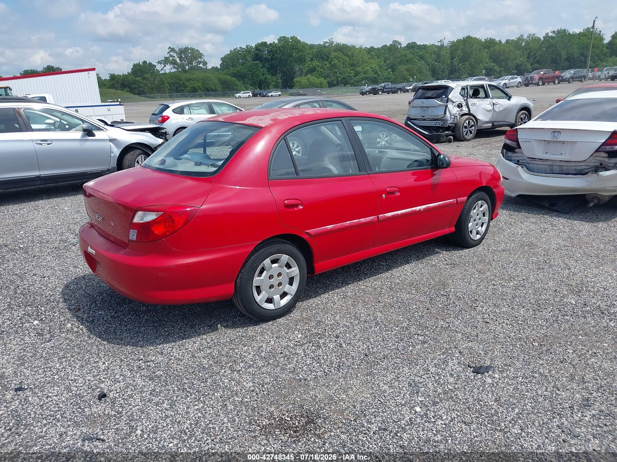 2002 Kia Rio   Red vin: KNADC123326167620