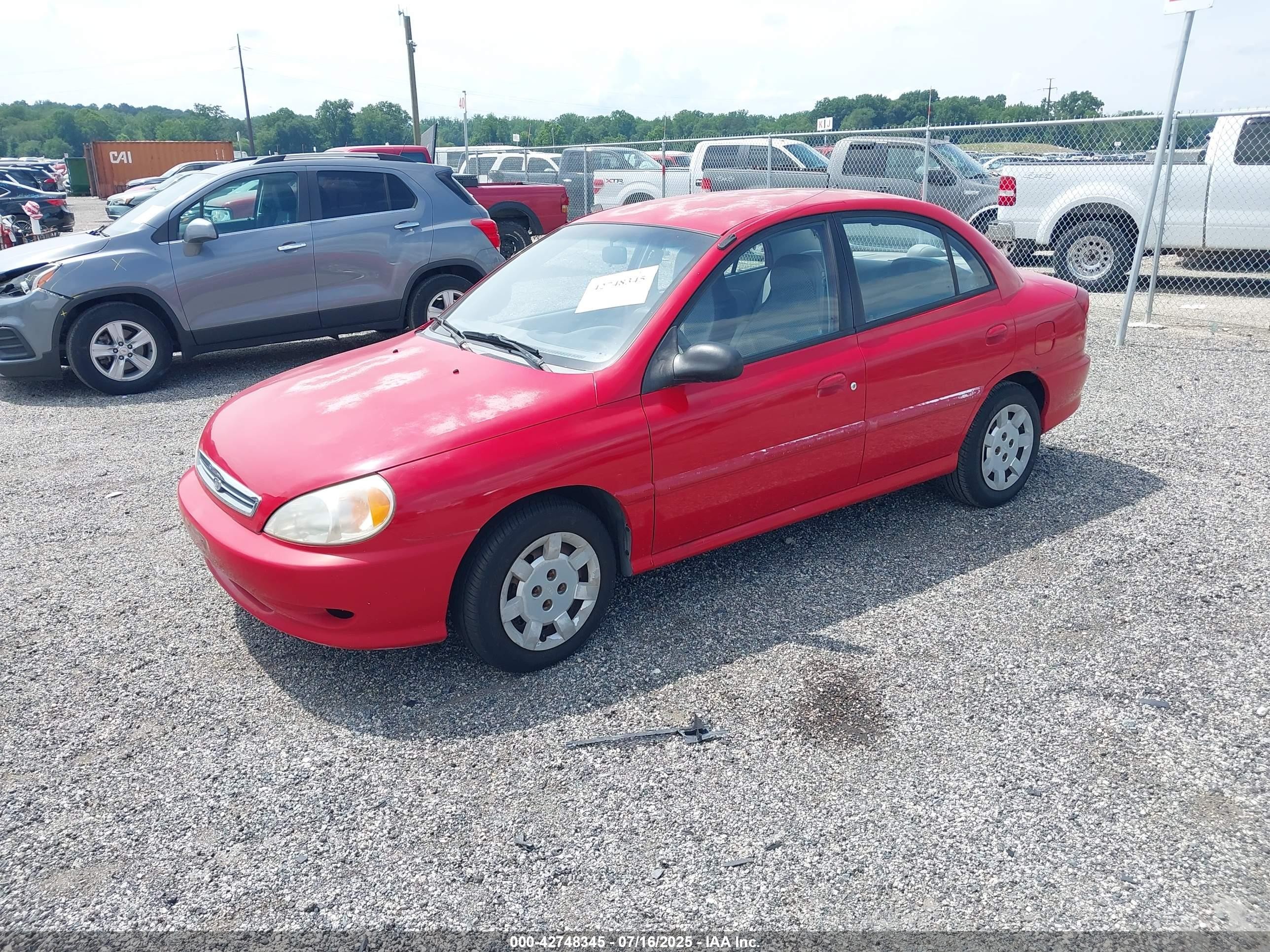 2002 Kia Rio   Red vin: KNADC123326167620