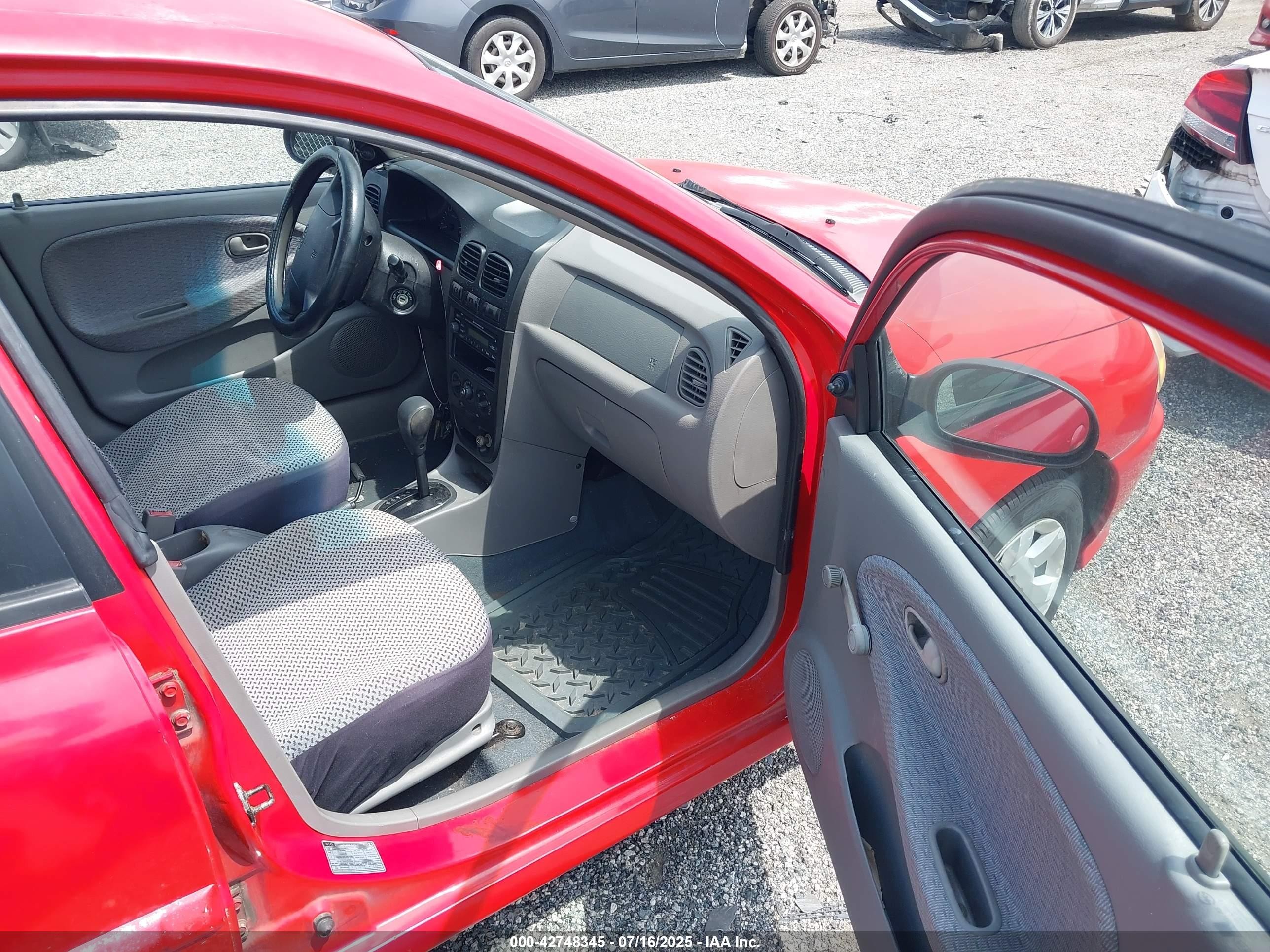 2002 Kia Rio   Red vin: KNADC123326167620