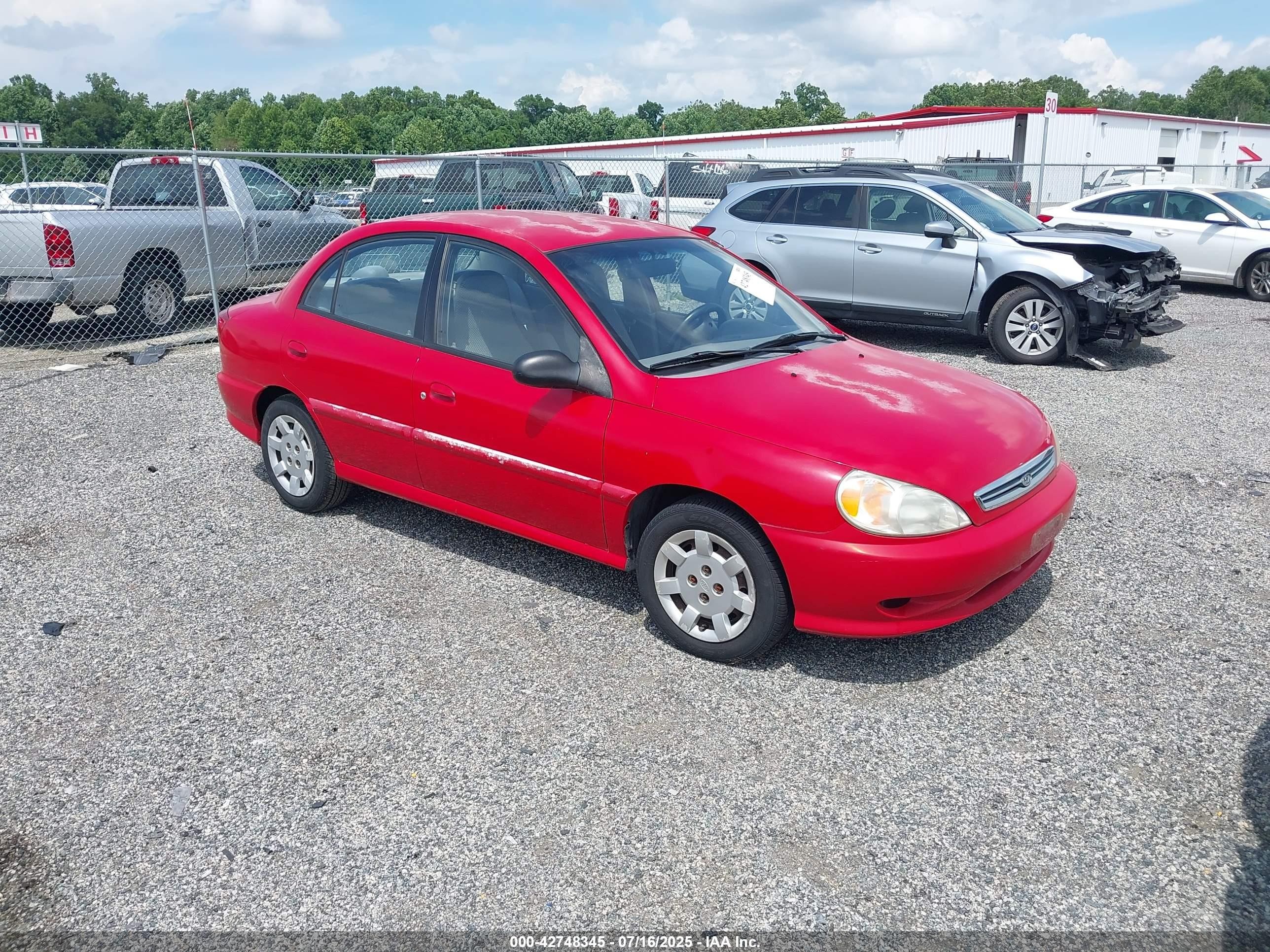 2002 Kia Rio   Red vin: KNADC123326167620