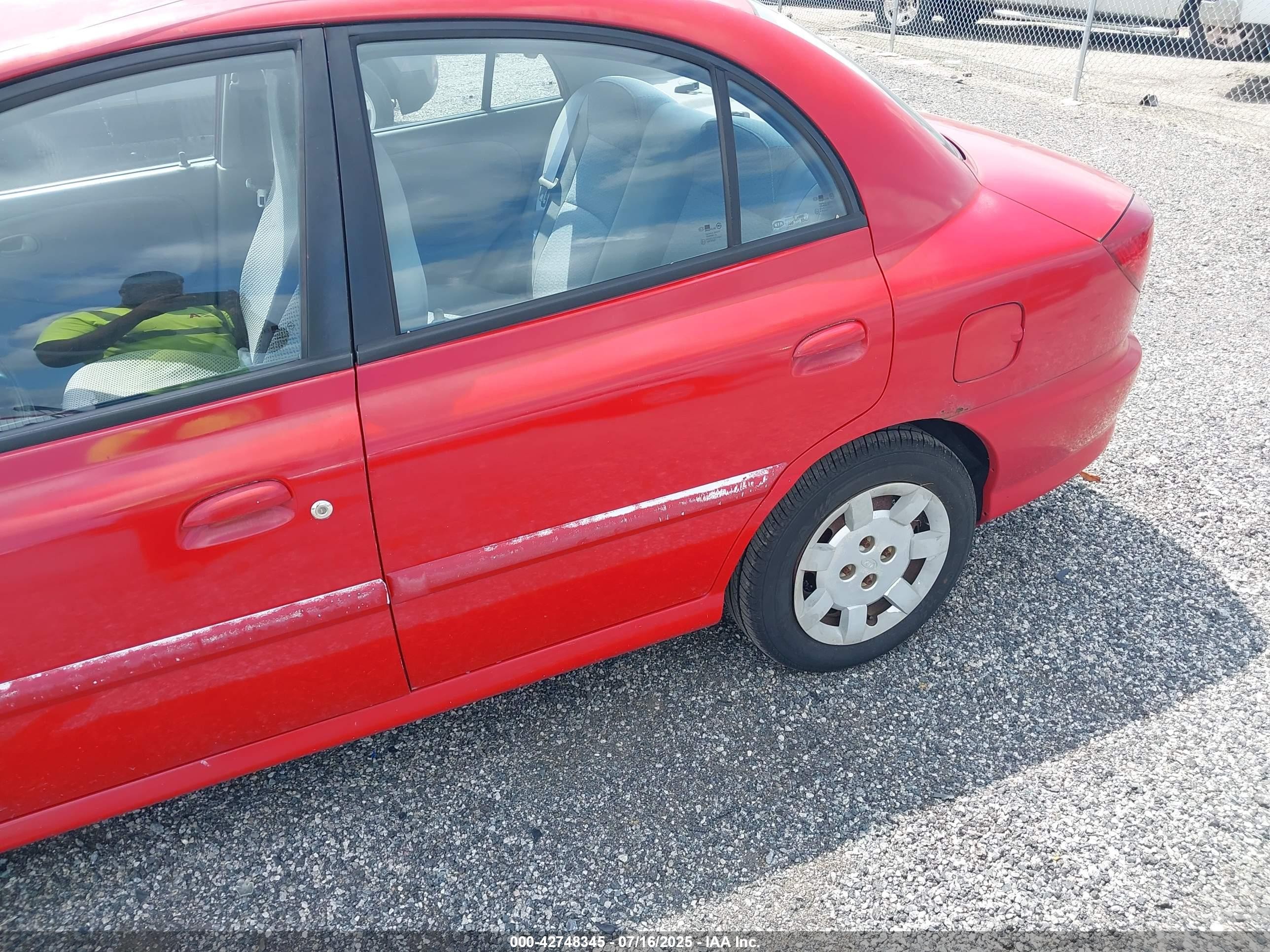 2002 Kia Rio   Red vin: KNADC123326167620