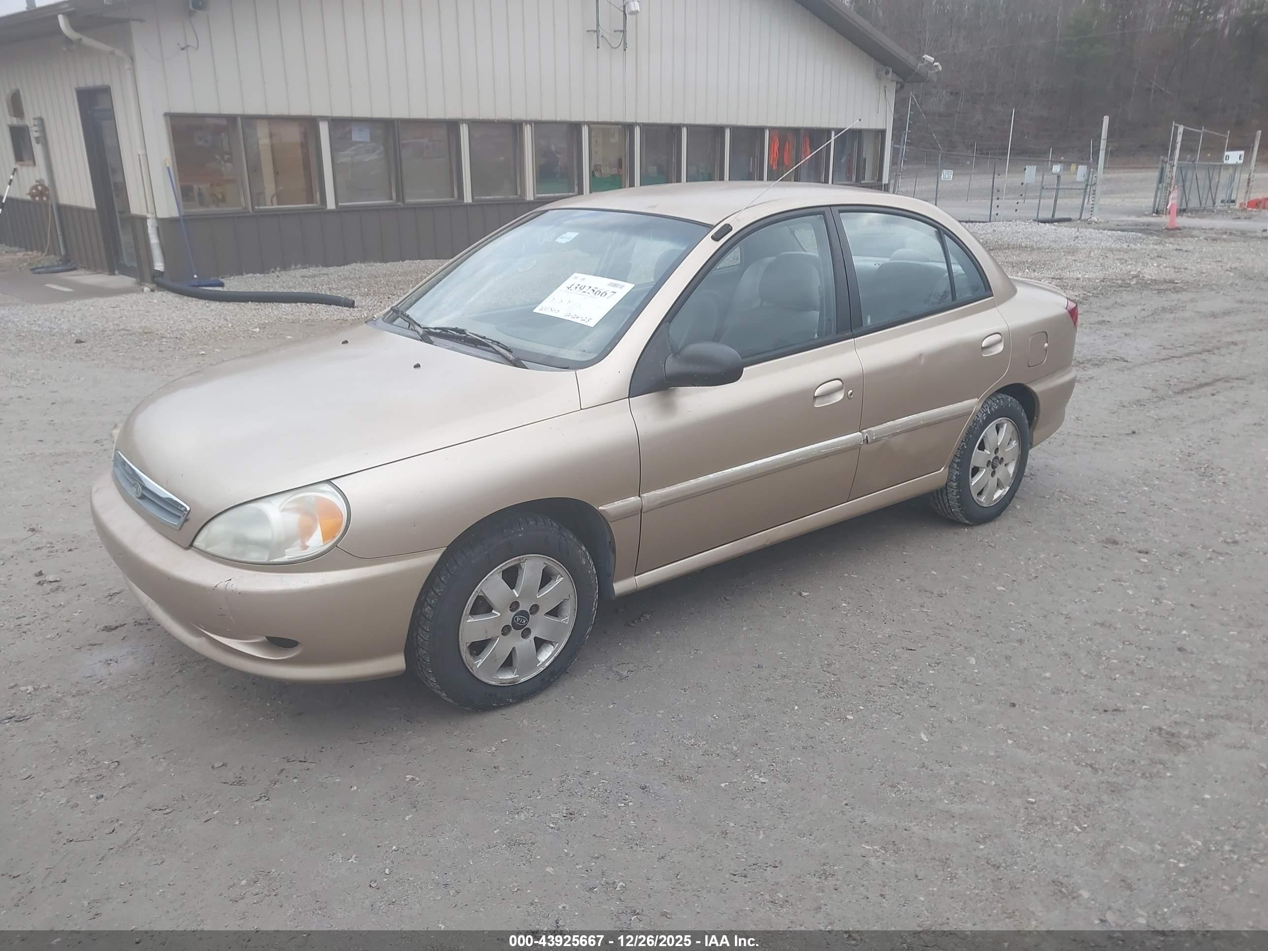 2002 Kia Rio   Gold vin: KNADC123526135493