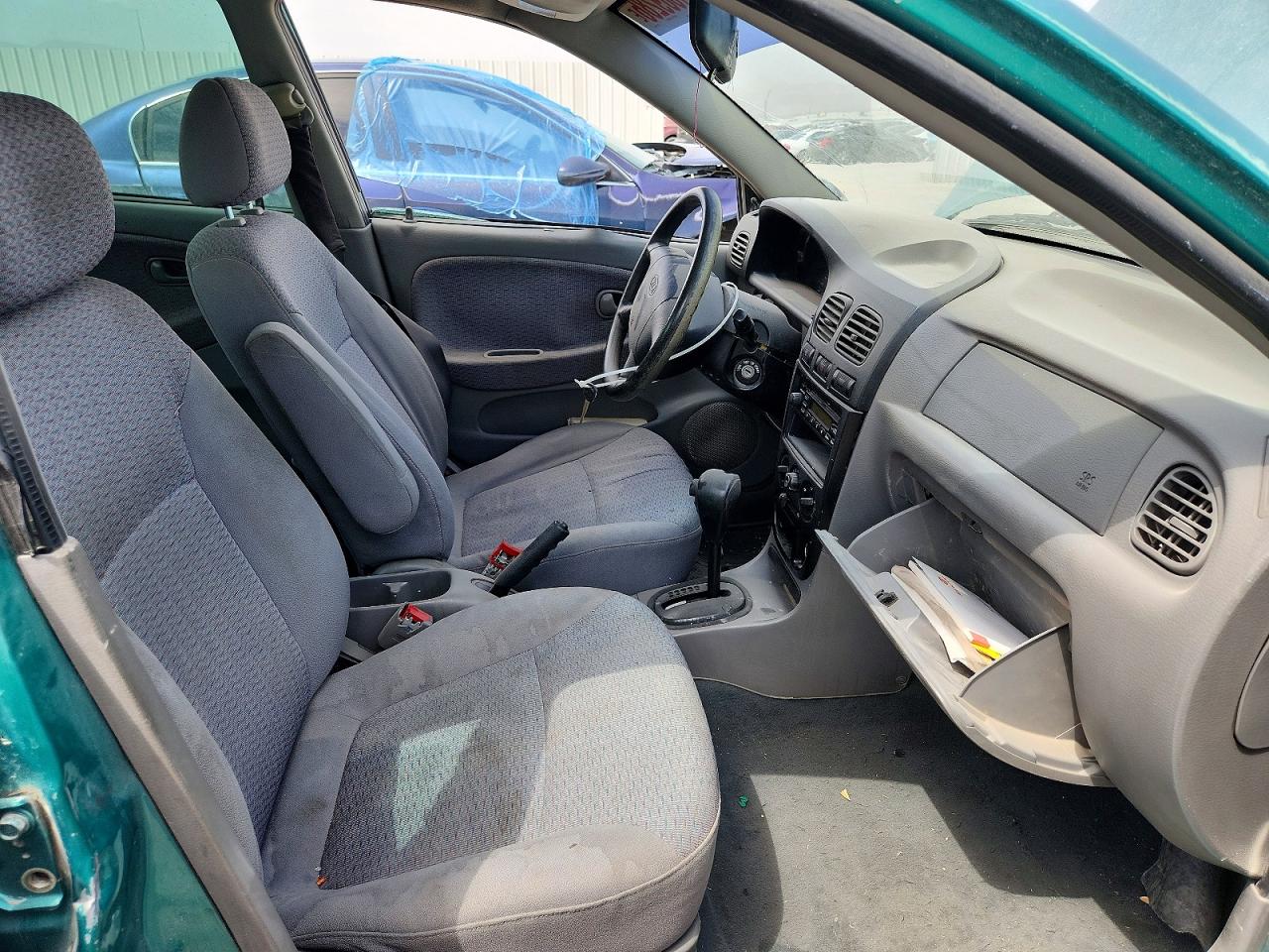 2002 Kia Rio Teal vin: KNADC123626179843