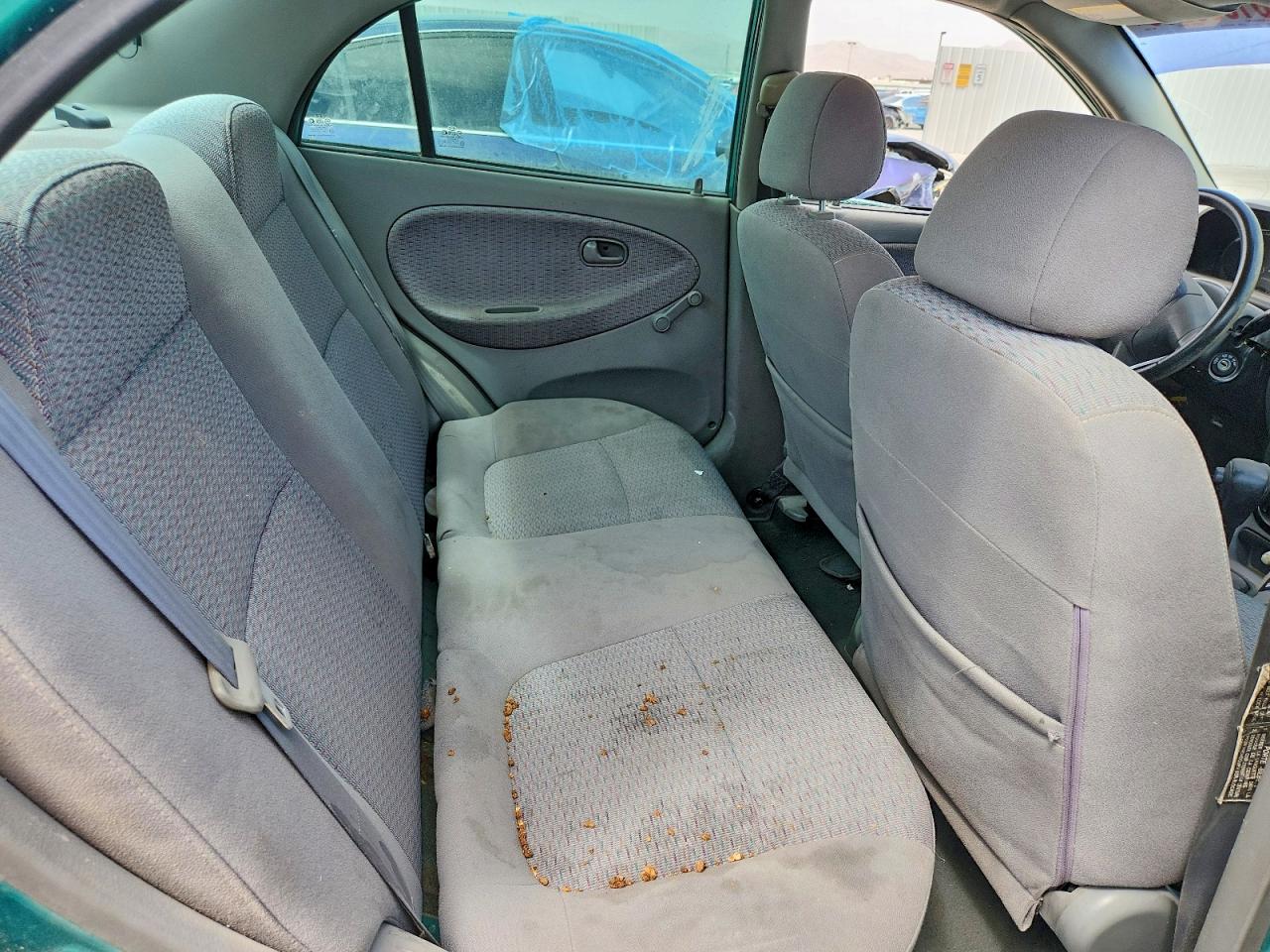 2002 Kia Rio Teal vin: KNADC123626179843