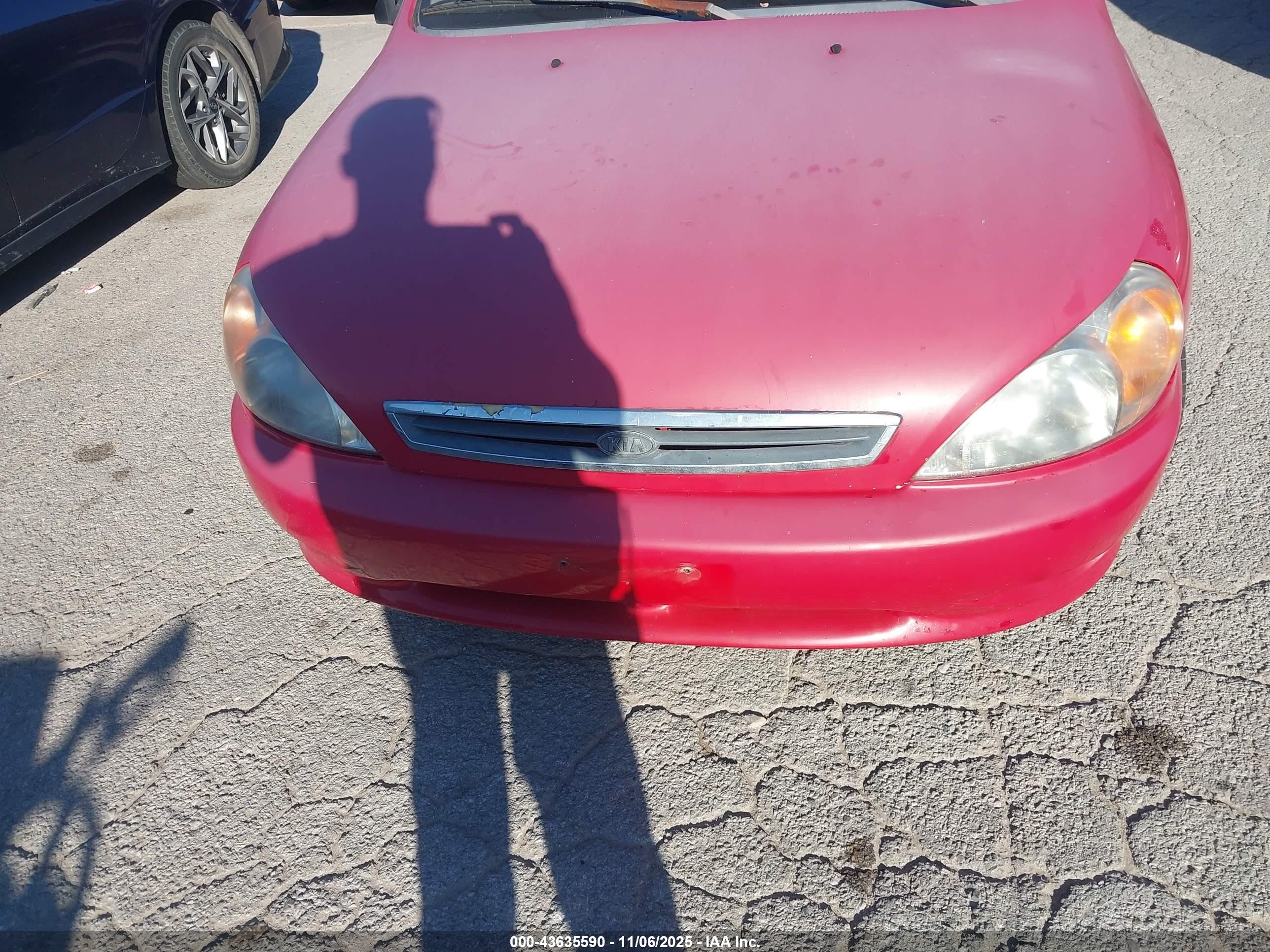 2002 Kia Rio   Red vin: KNADC123926094298