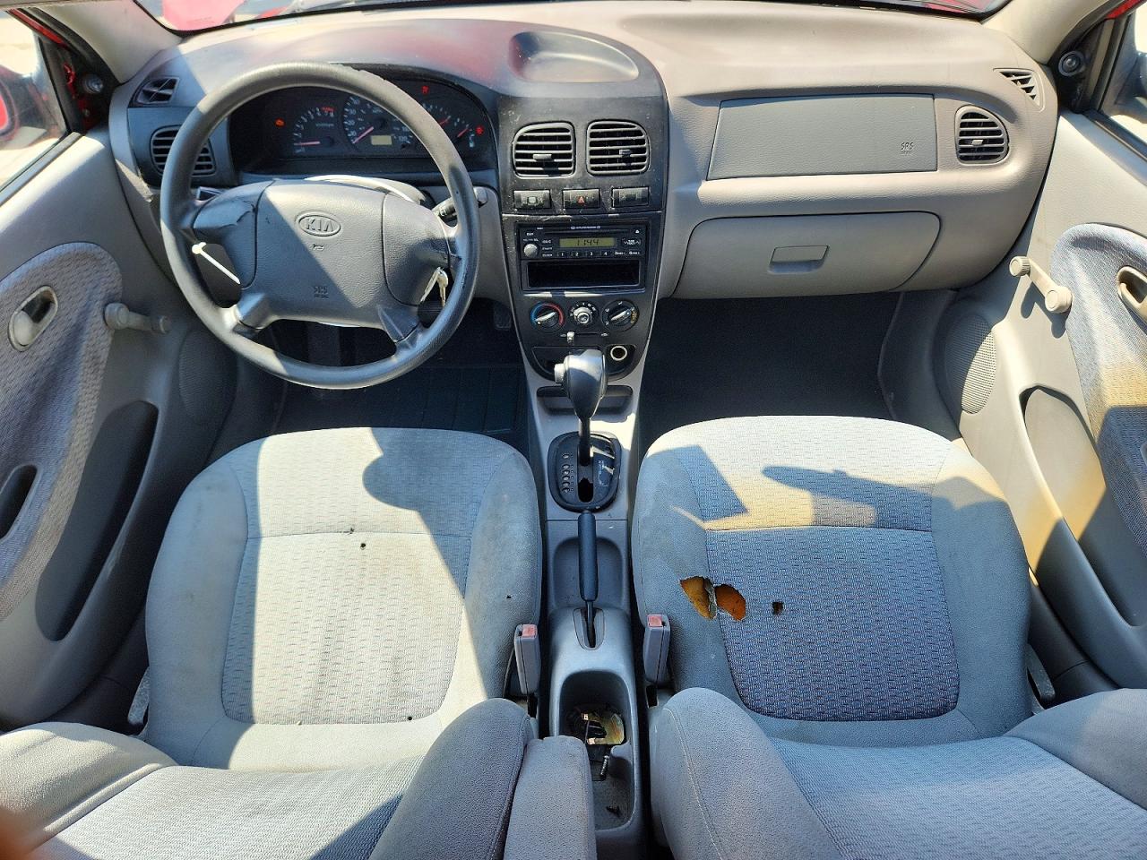 2002 Kia Rio Base Red vin: KNADC123926094298