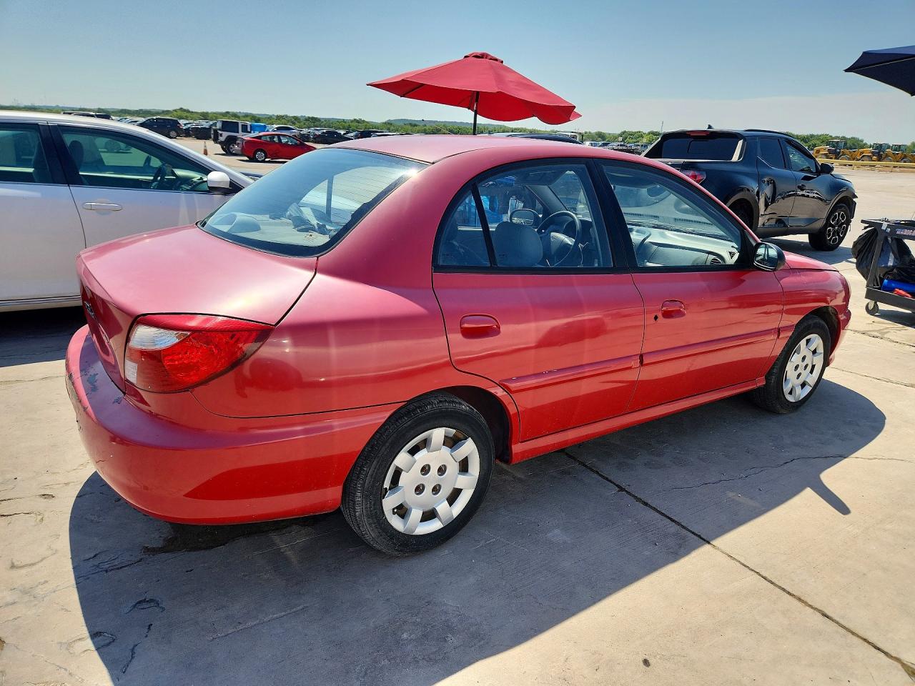 2002 Kia Rio Base Red vin: KNADC123926094298