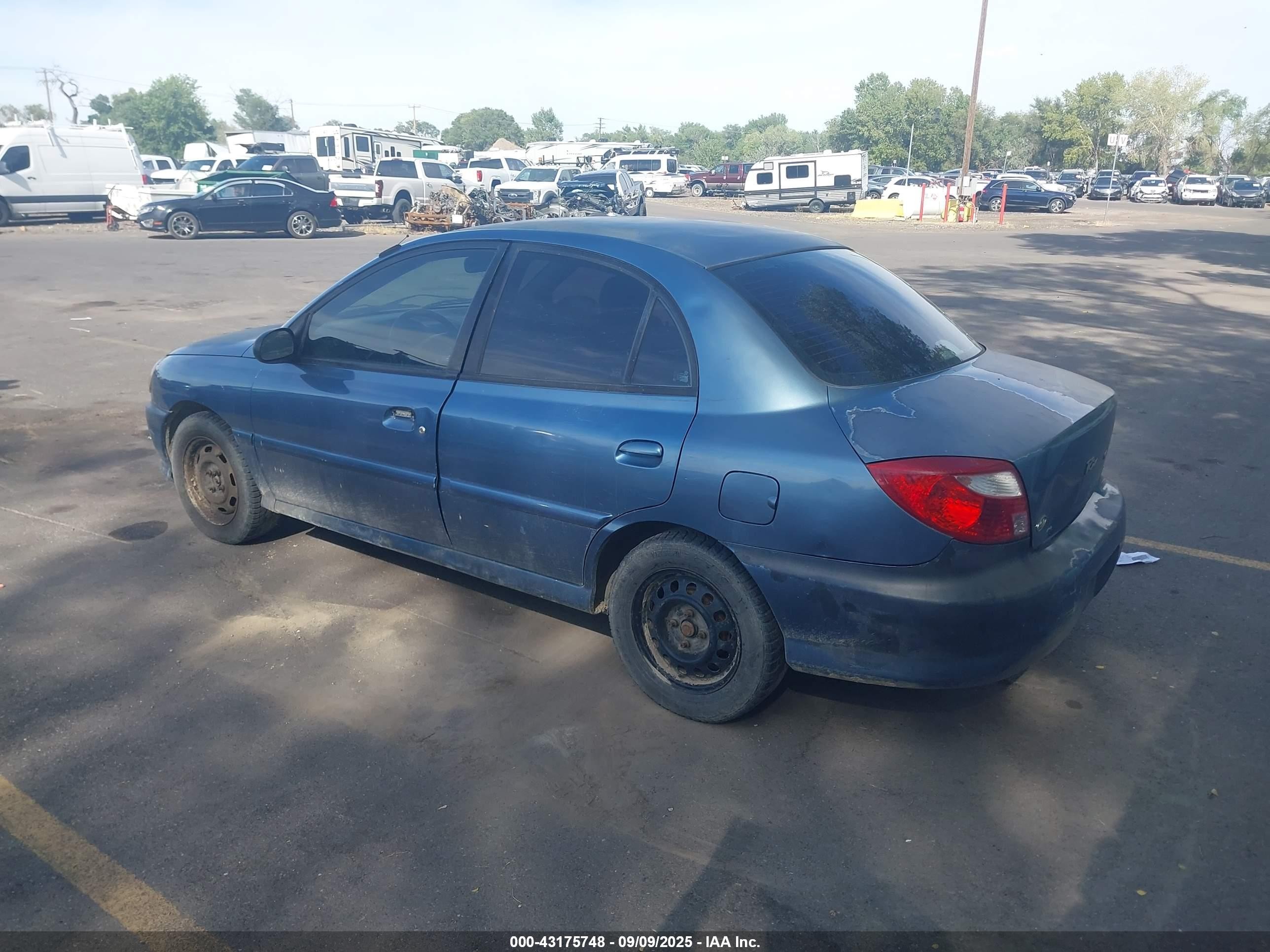2002 Kia Rio   Blue vin: KNADC123926157156