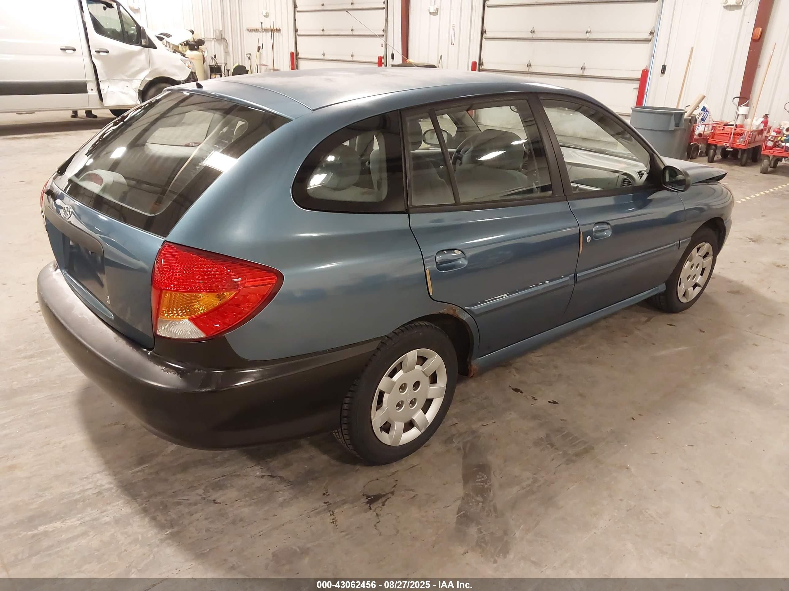 2002 Kia Rio Cinco Blue vin: KNADC163326056351