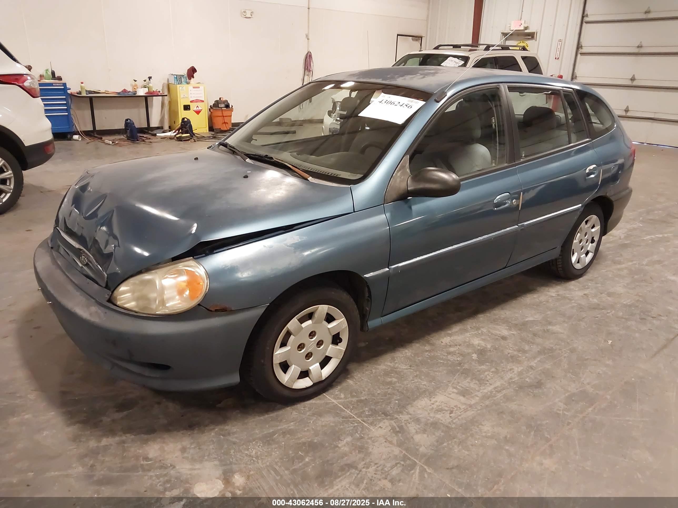 2002 Kia Rio Cinco Blue vin: KNADC163326056351