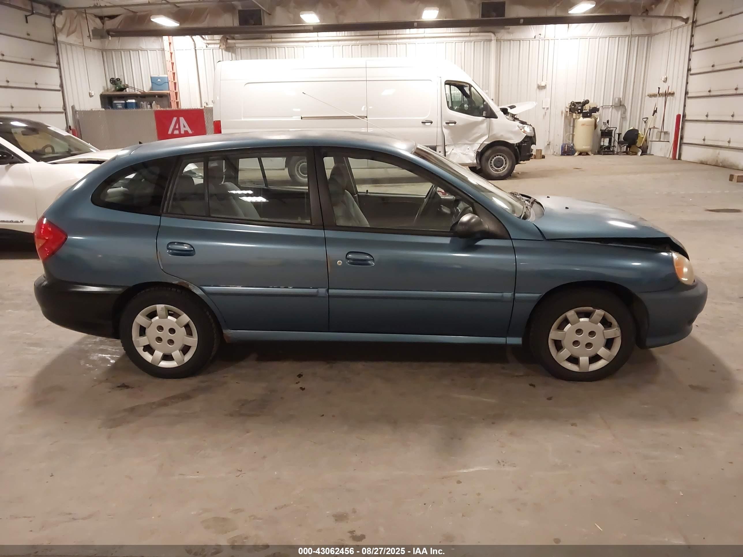 2002 Kia Rio Cinco Blue vin: KNADC163326056351