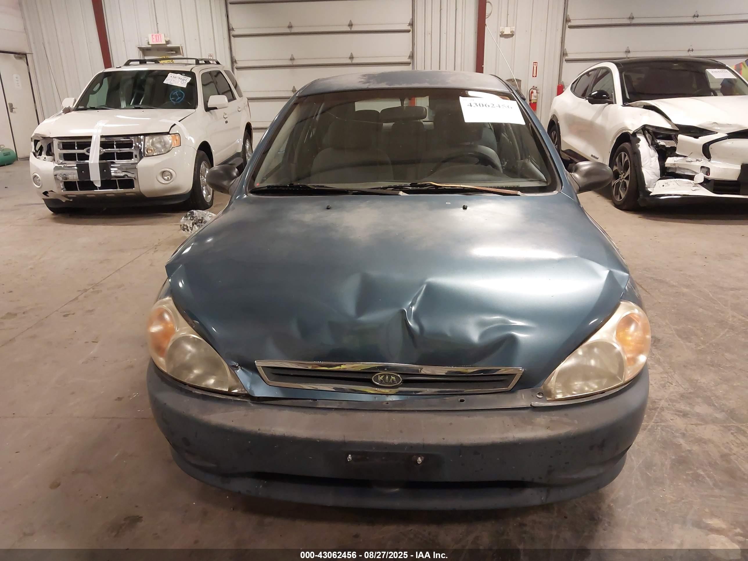 2002 Kia Rio Cinco Blue vin: KNADC163326056351
