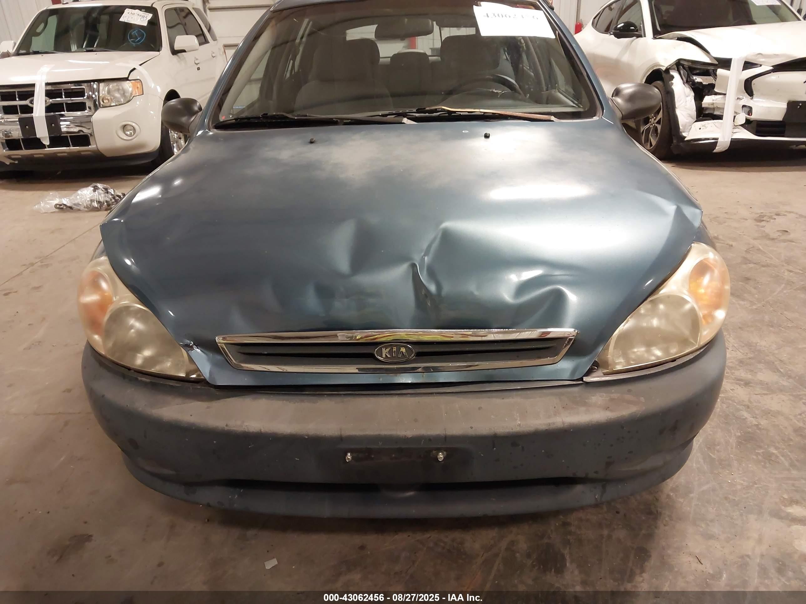 2002 Kia Rio Cinco Blue vin: KNADC163326056351