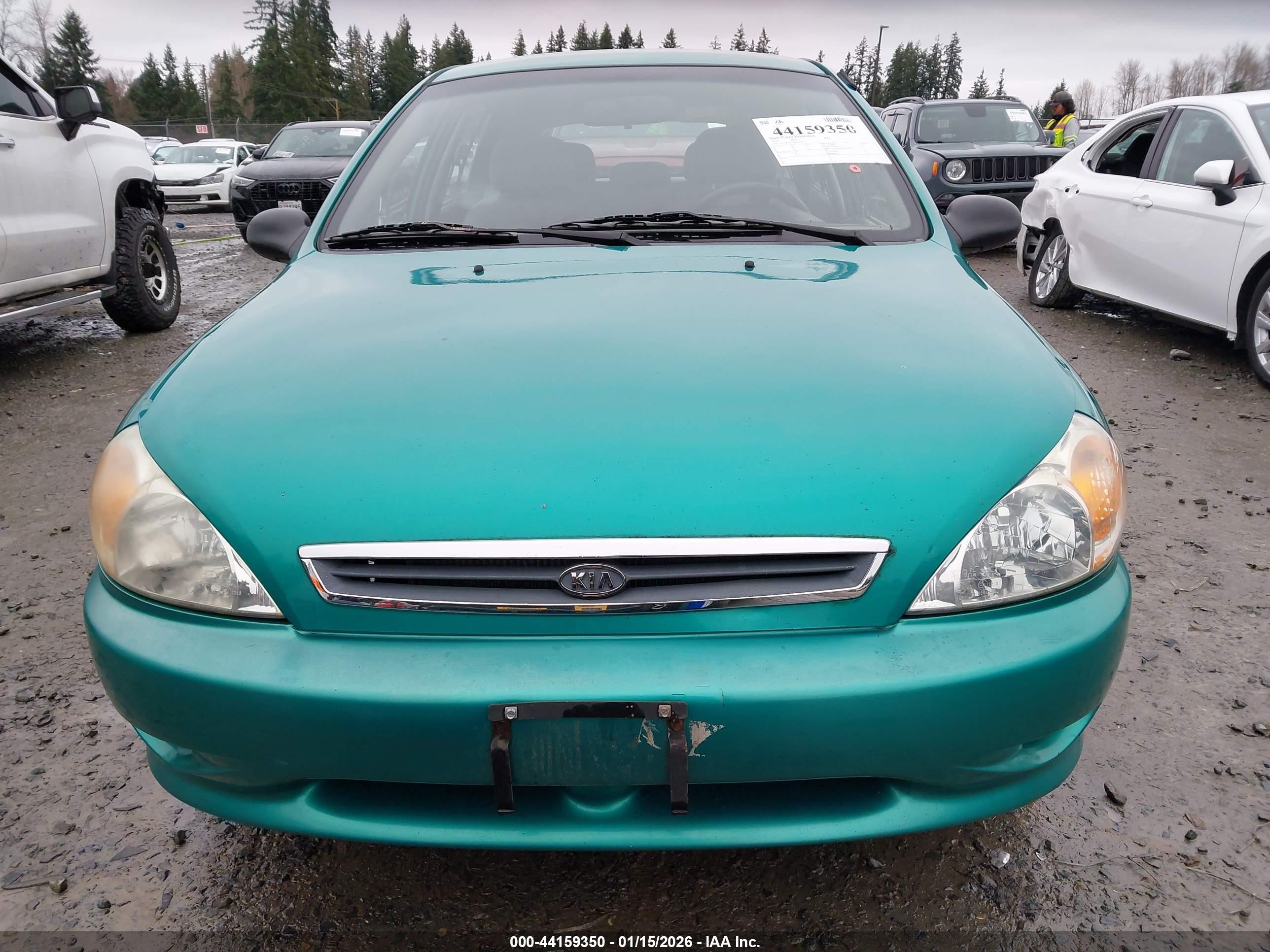 2002 Kia Rio Cinco Teal vin: KNADC163426037100