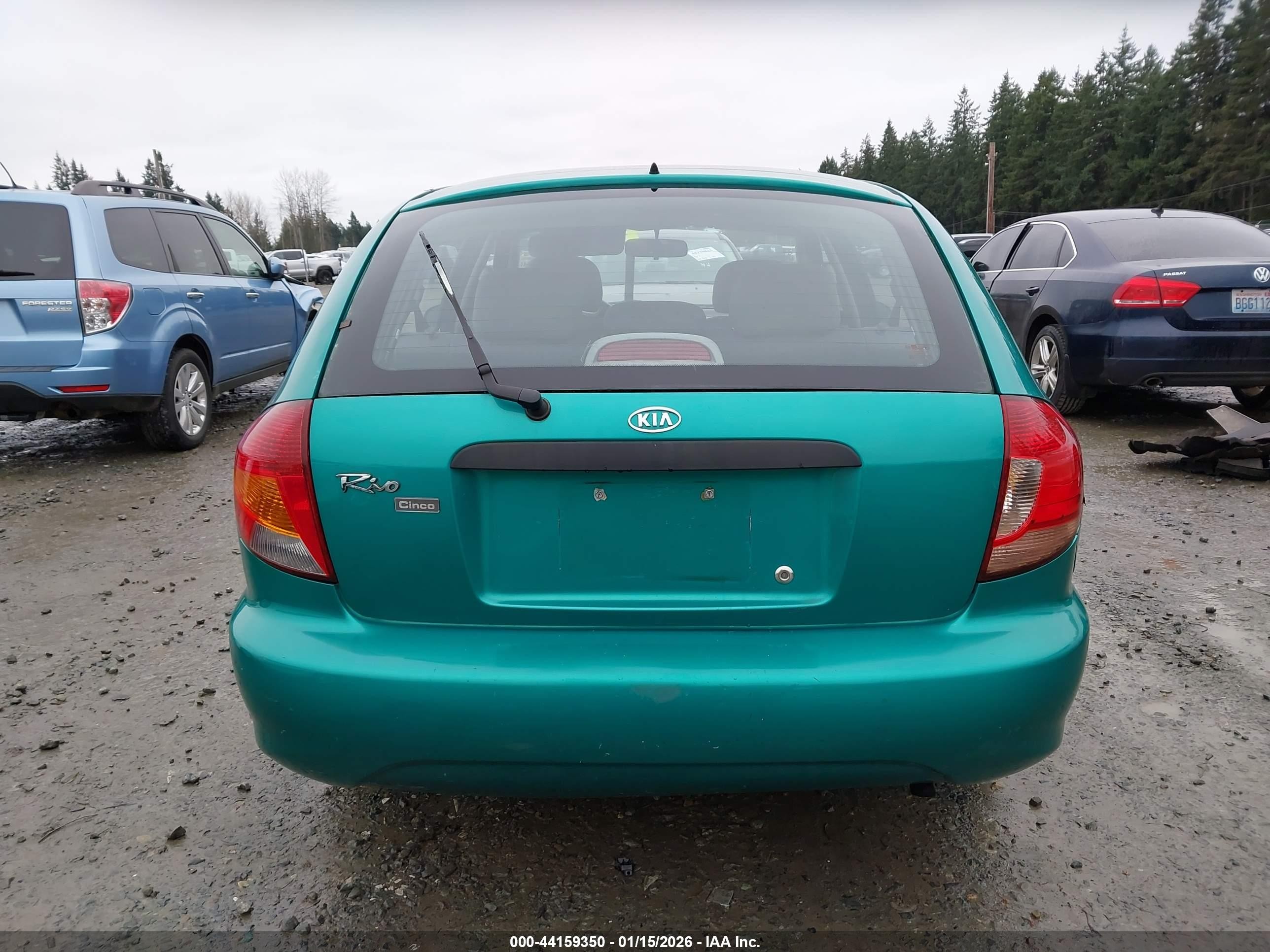 2002 Kia Rio Cinco Teal vin: KNADC163426037100