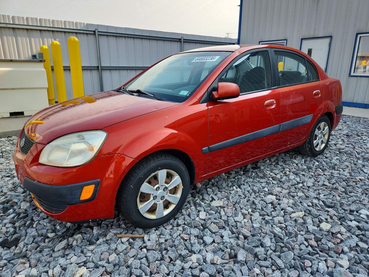 2007 Kia Rio Base Red vin: KNADE123076203992