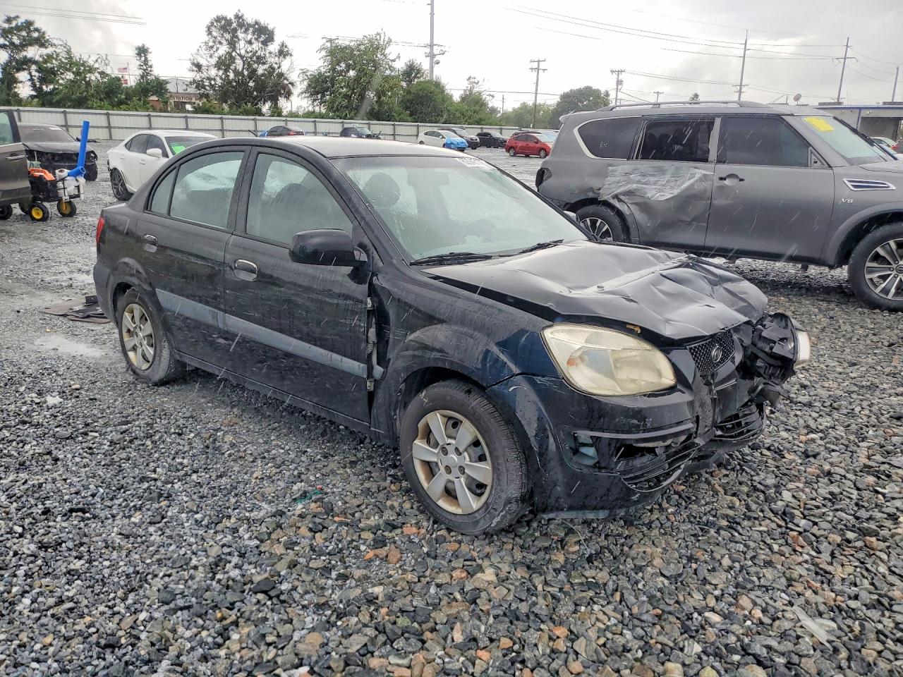 2006 Kia Rio Base Black vin: KNADE123166136575