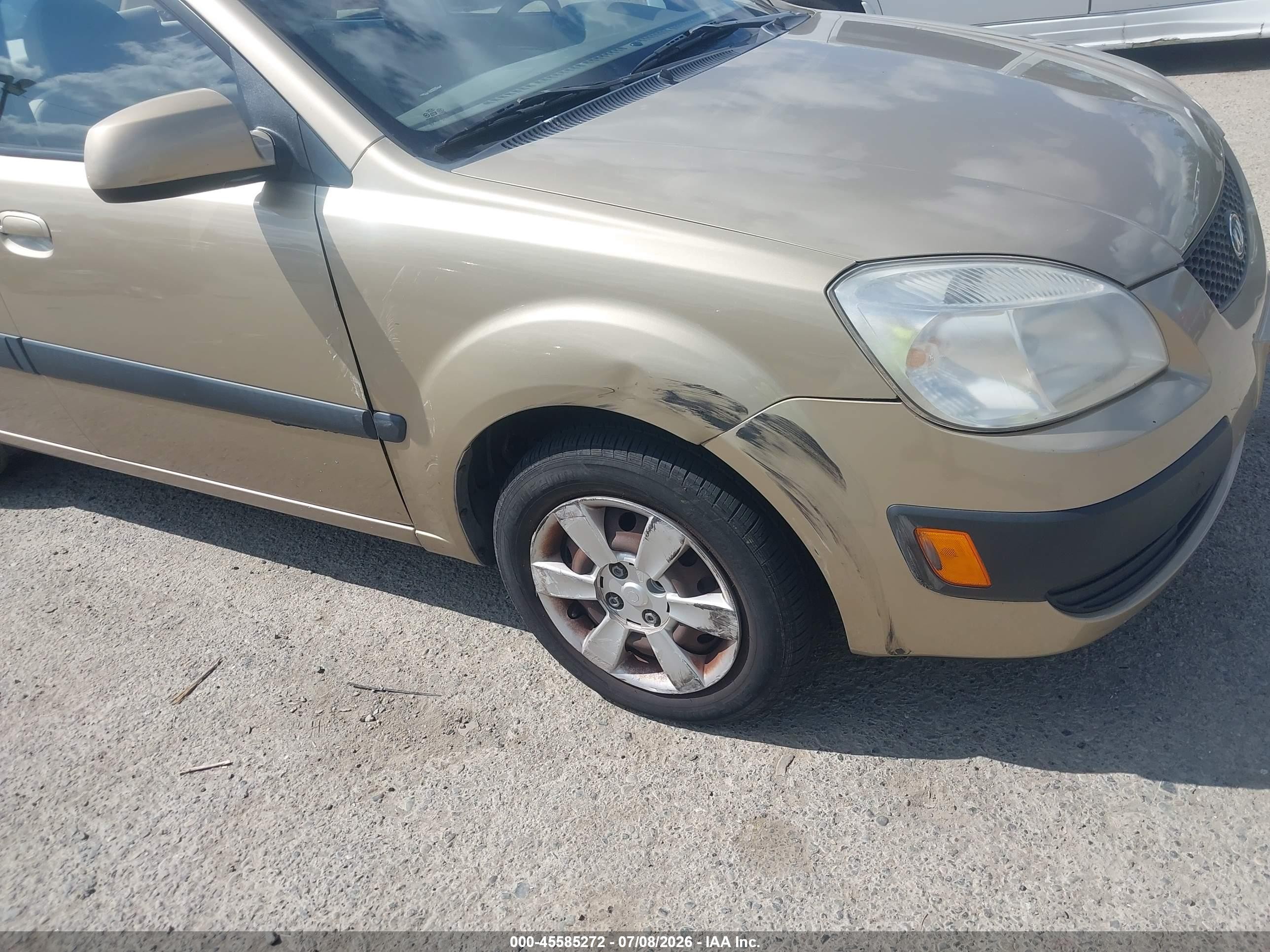 2007 Kia Rio Lx Tan vin: KNADE123276253440
