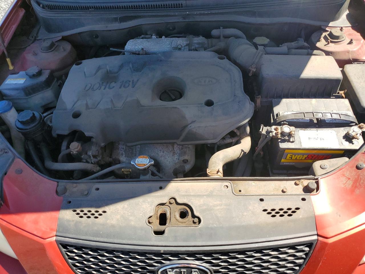 2007 Kia Rio Base Red vin: KNADE123276277396