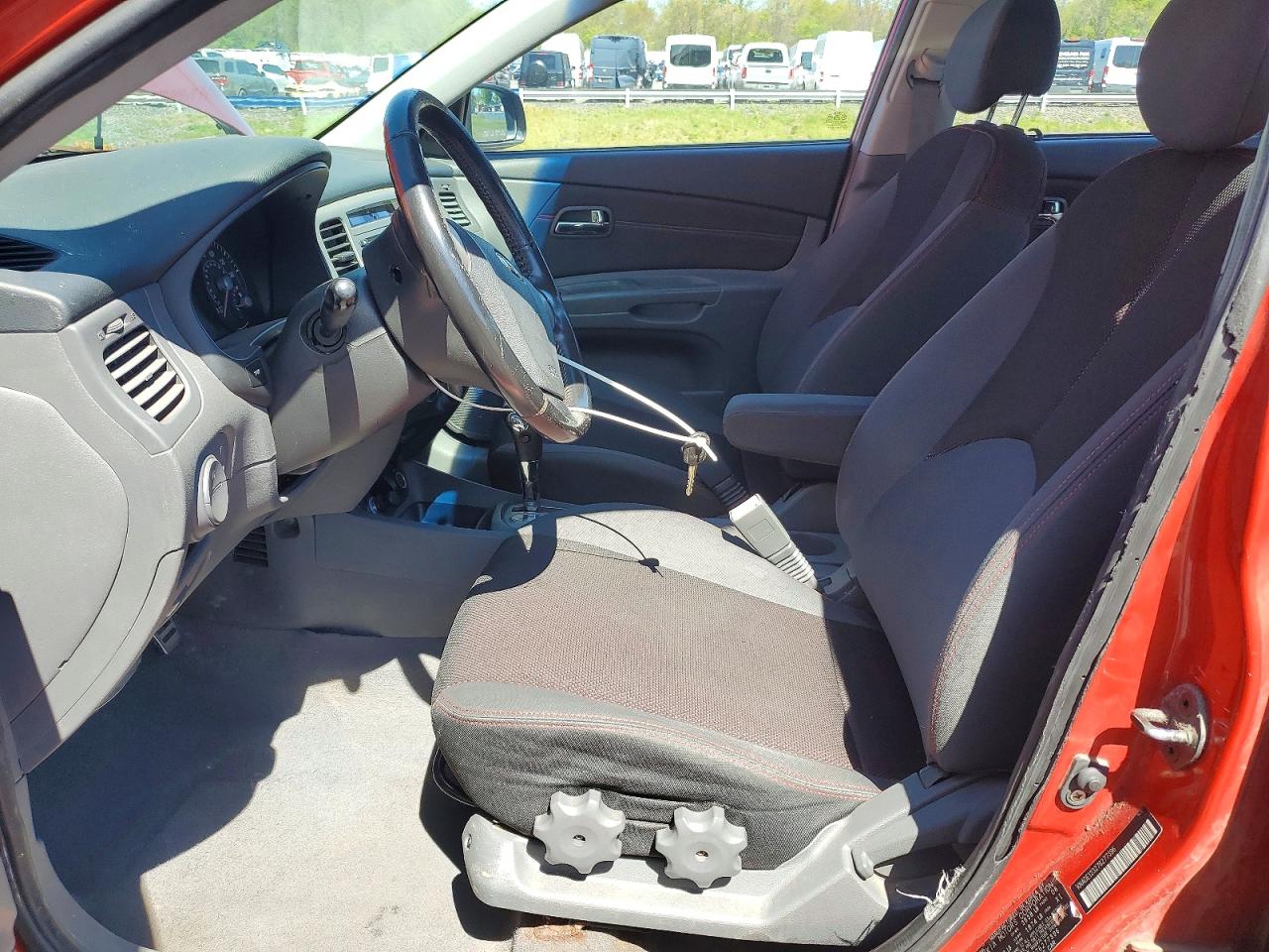2007 Kia Rio Base Red vin: KNADE123276277396