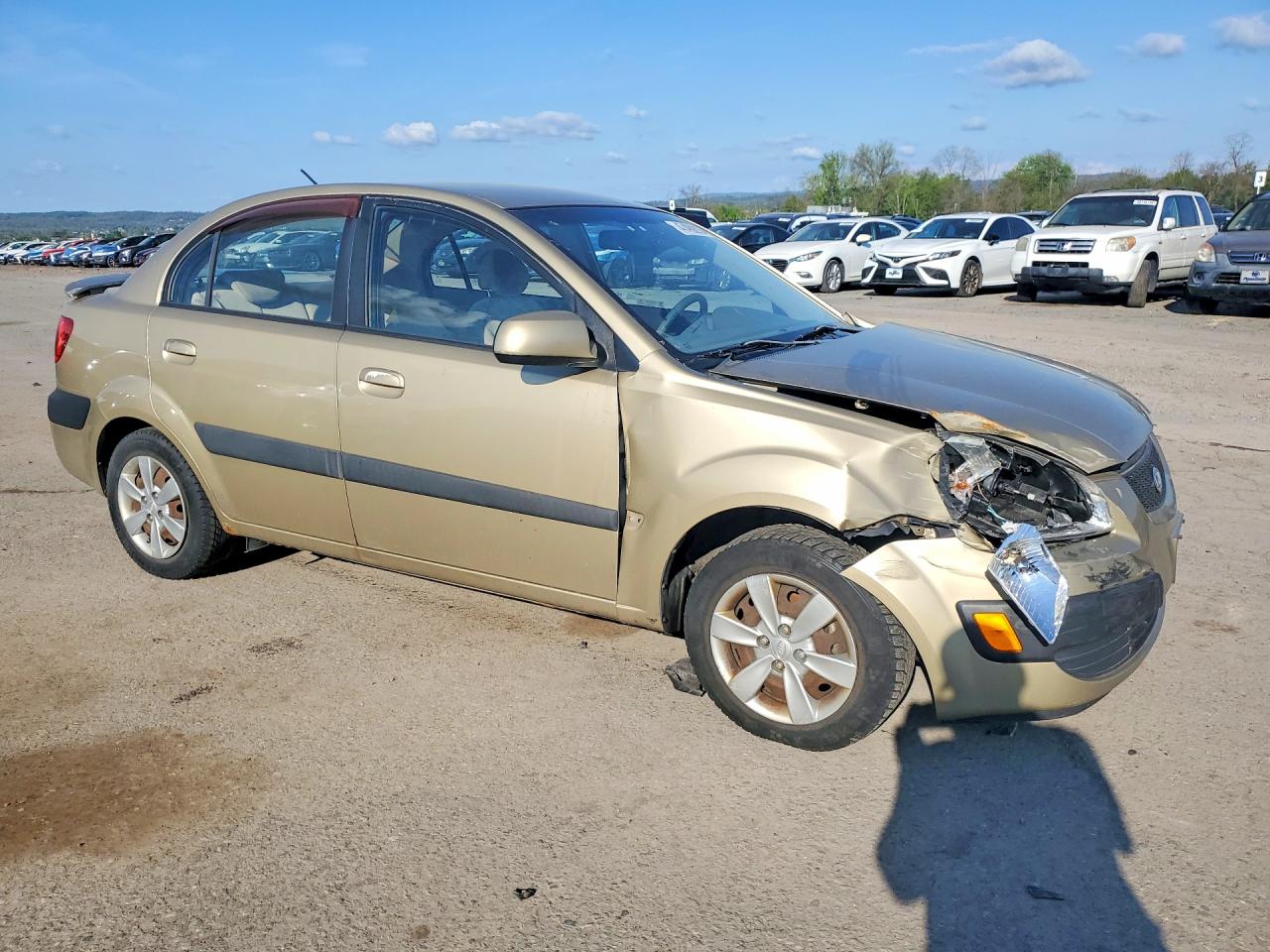 2008 Kia Rio Base Tan vin: KNADE123286397488