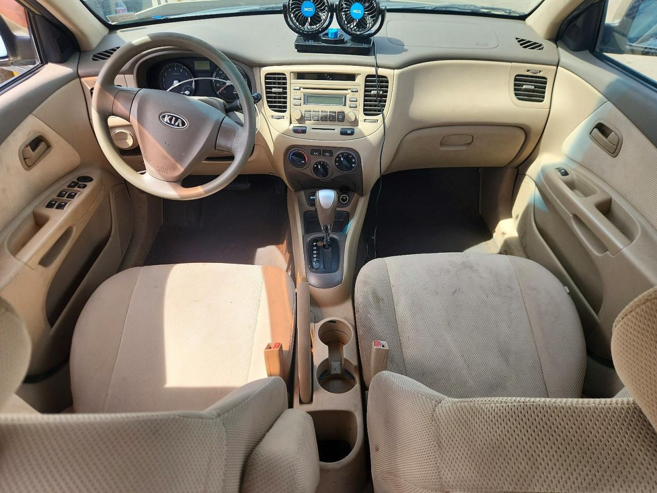 2008 Kia Rio Base Tan vin: KNADE123286397488