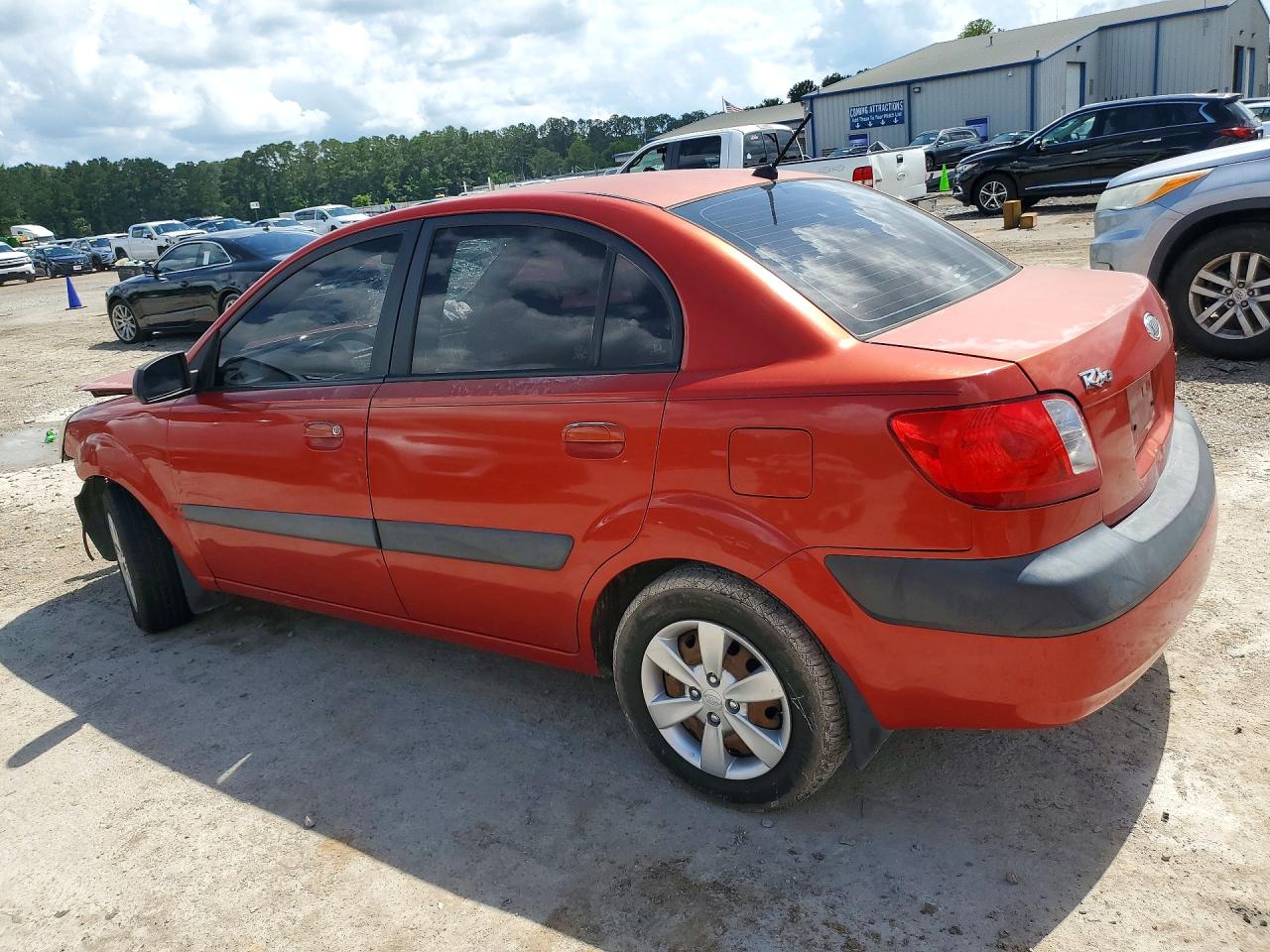 2008 Kia Rio Base Orange vin: KNADE123486322839