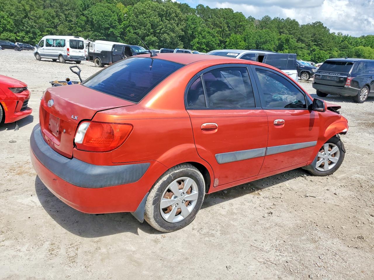 2008 Kia Rio Base Orange vin: KNADE123486322839