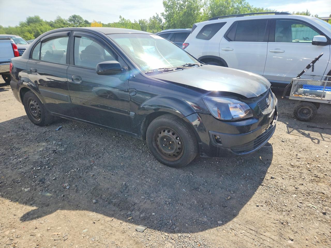 2006 Kia Rio Base Black vin: KNADE123666167059