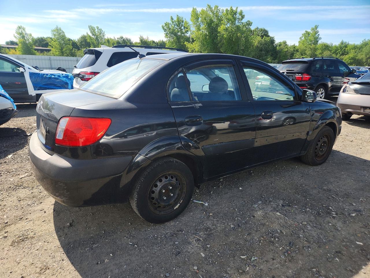 2006 Kia Rio Base Black vin: KNADE123666167059