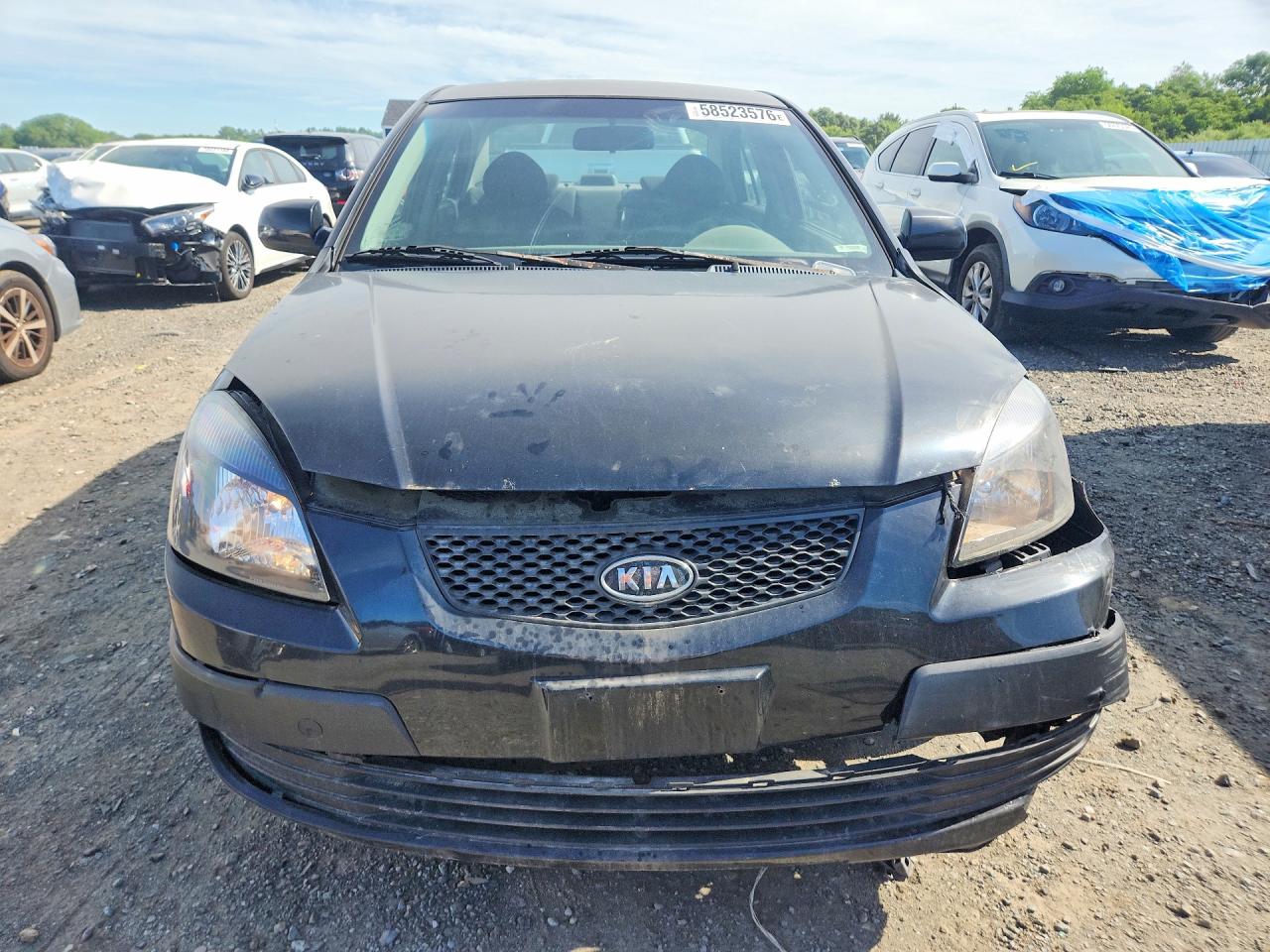 2006 Kia Rio Base Black vin: KNADE123666167059