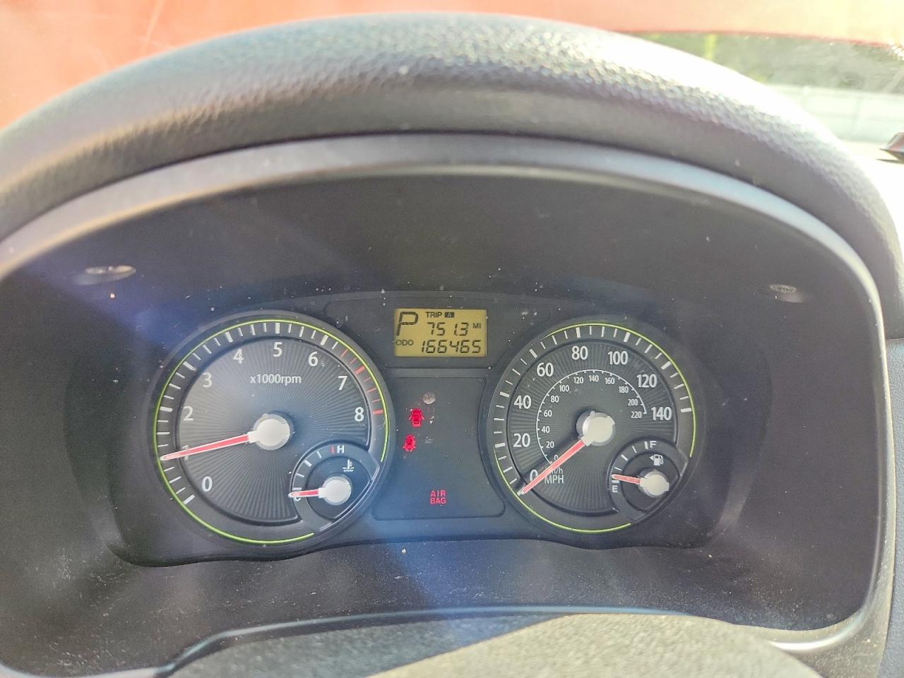 2007 Kia Rio Base Orange vin: KNADE123876187248