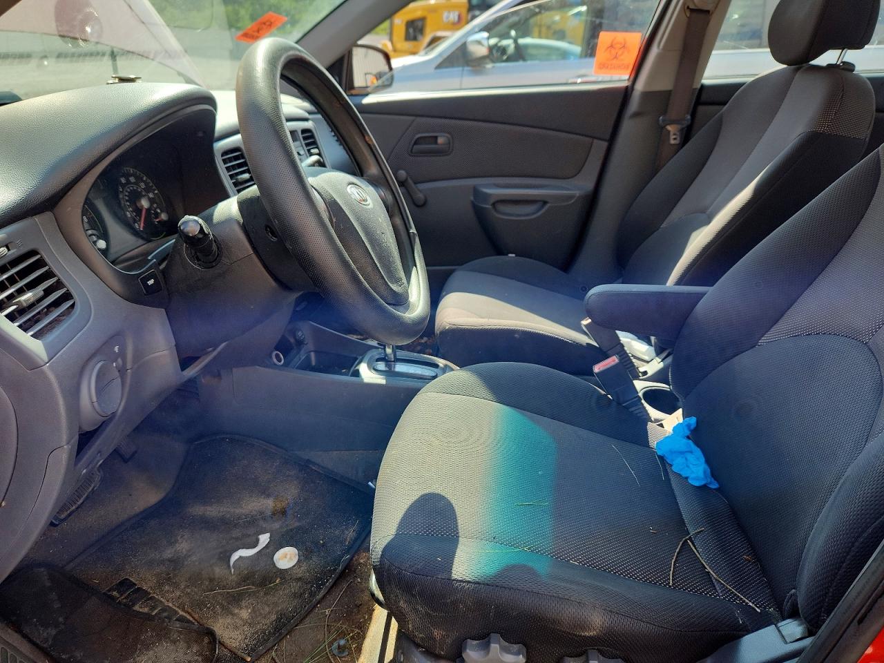 2007 Kia Rio Base Orange vin: KNADE123876187248
