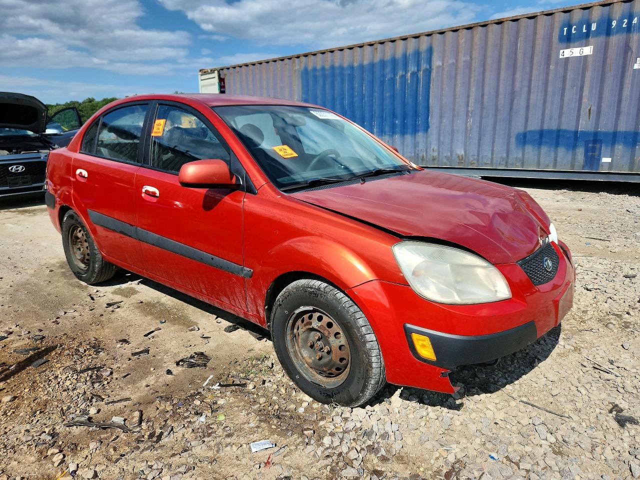 2007 Kia Rio Base Orange vin: KNADE123876187248