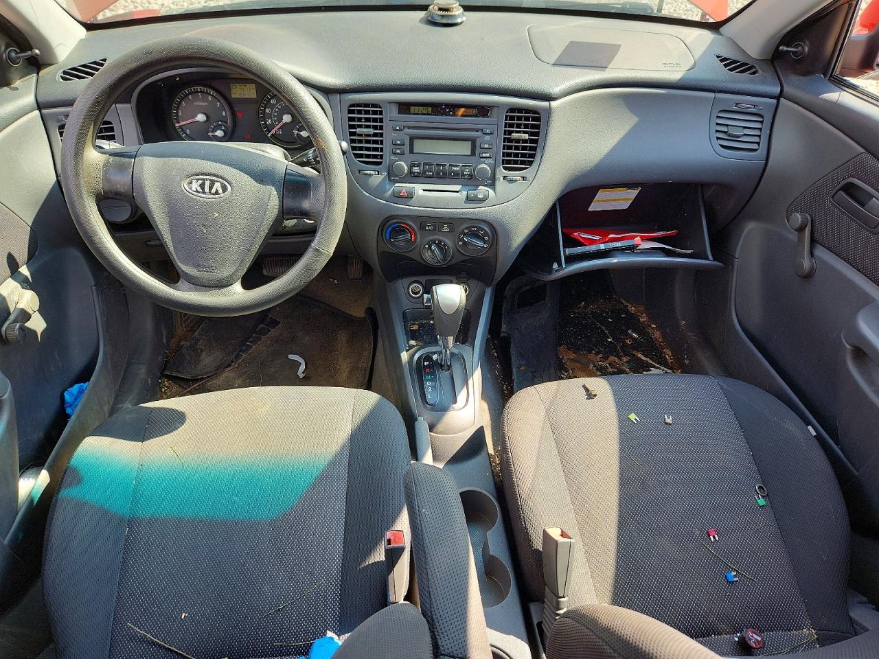 2007 Kia Rio Base Orange vin: KNADE123876187248