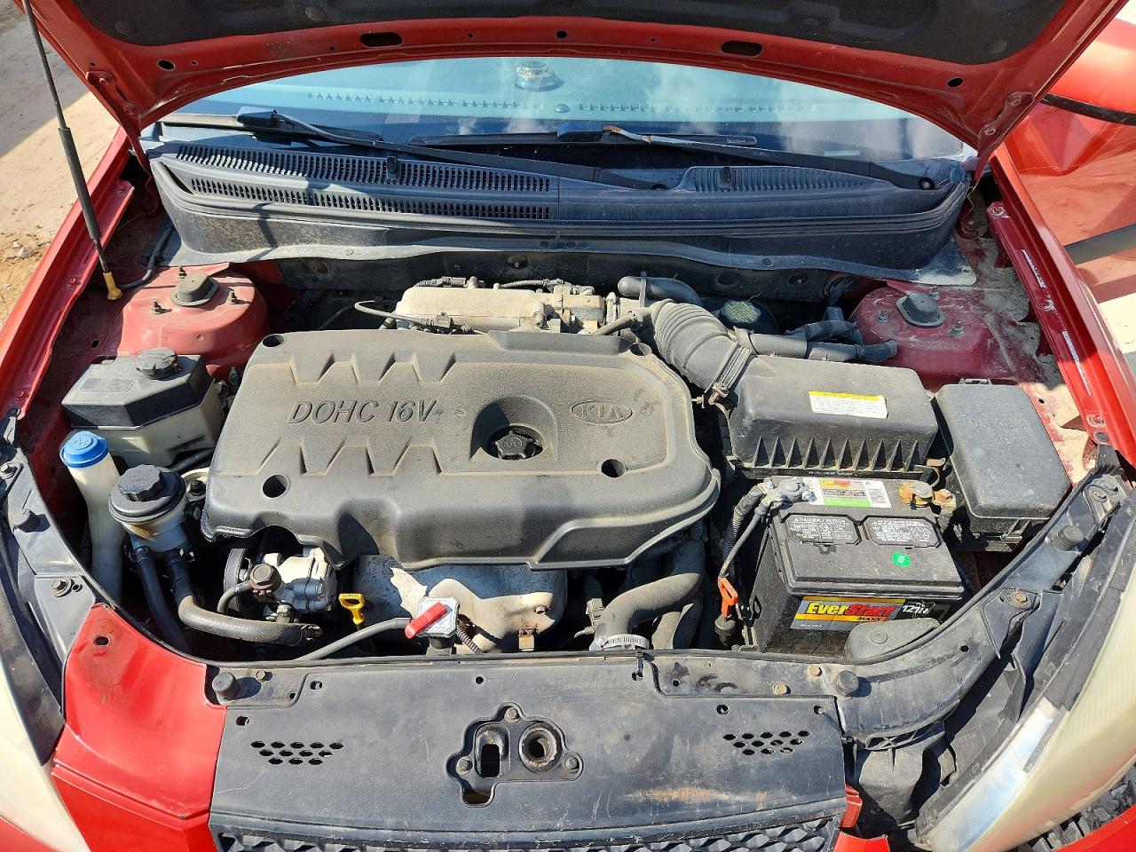 2007 Kia Rio Base Orange vin: KNADE123876187248