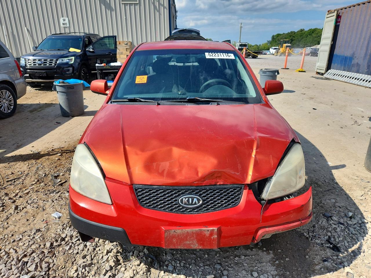 2007 Kia Rio Base Orange vin: KNADE123876187248