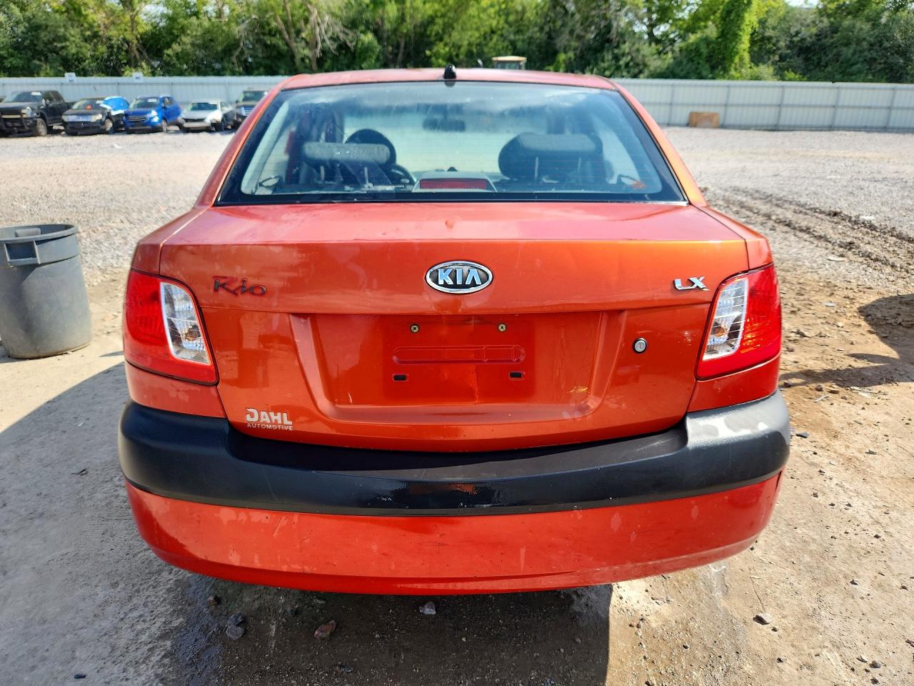 2007 Kia Rio Base Orange vin: KNADE123876187248