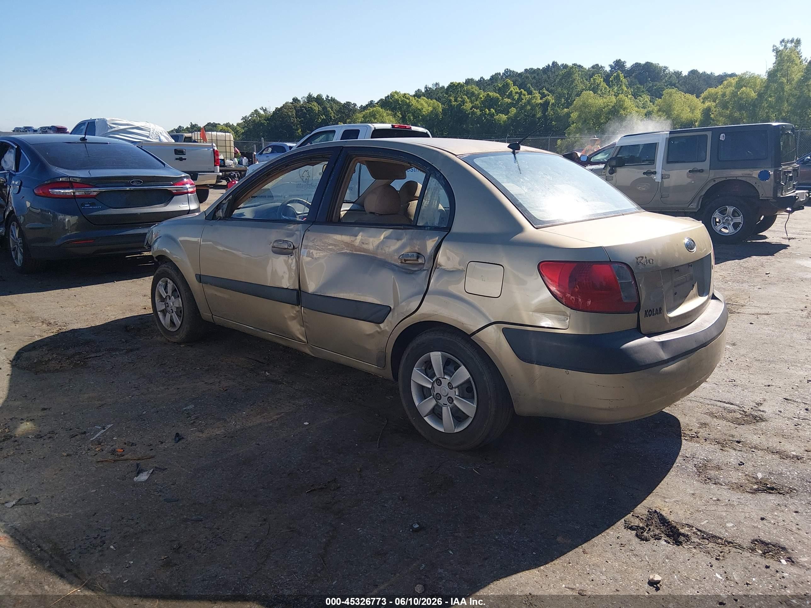 2006 Kia Rio Lx Gold vin: KNADE123966149381