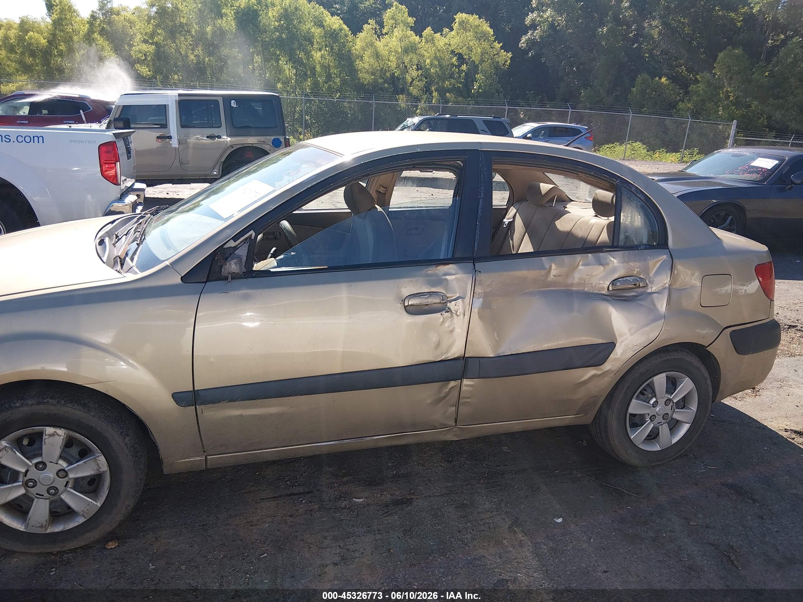 2006 Kia Rio Lx Gold vin: KNADE123966149381