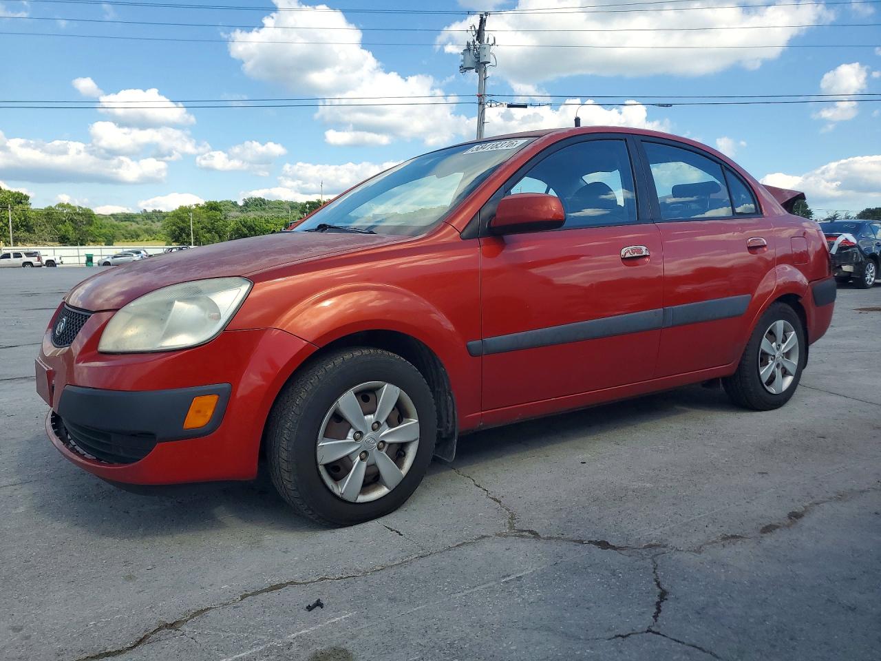 2008 Kia Rio Base Orange vin: KNADE123986322383